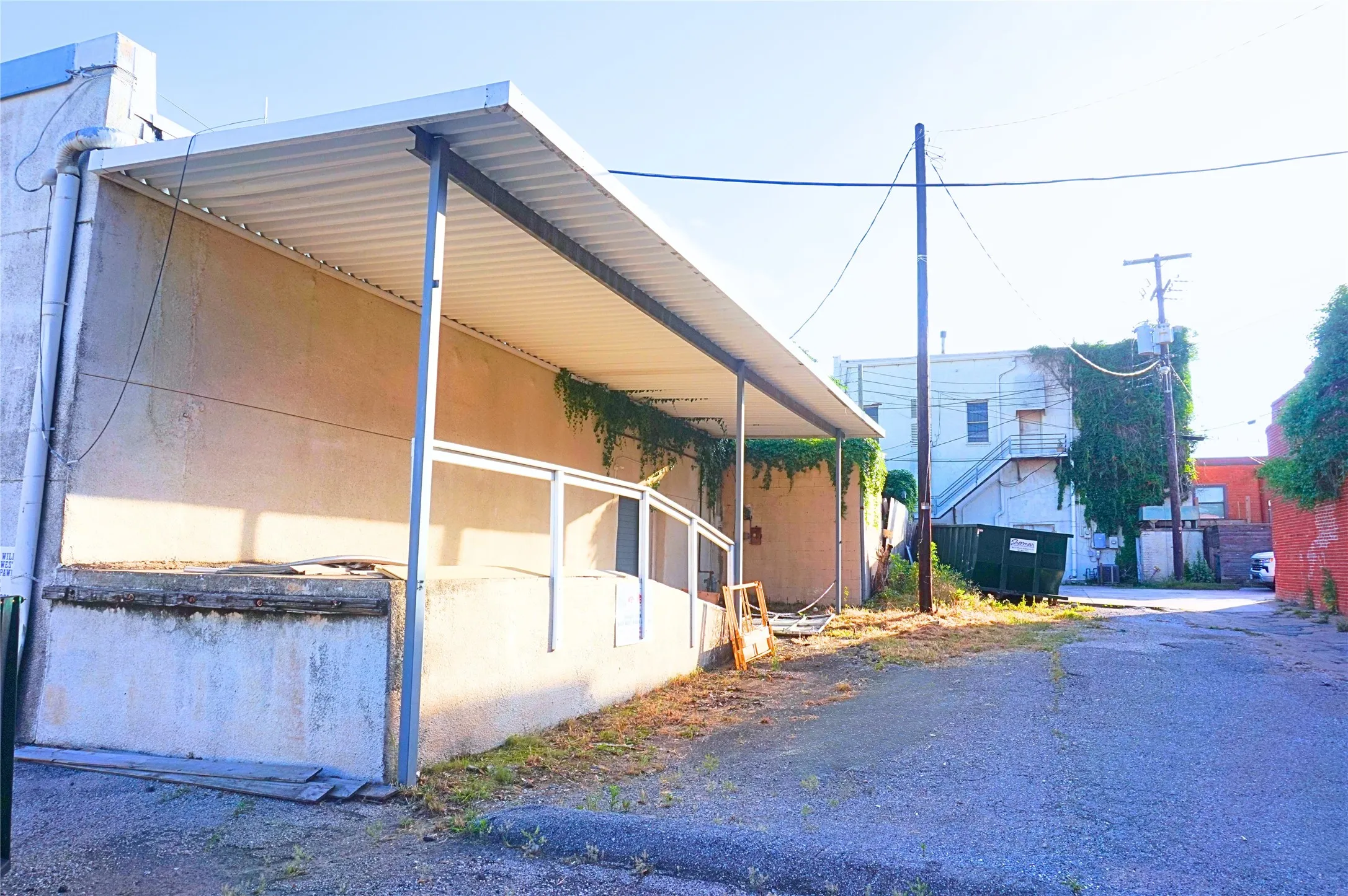 Covered loading dock and alley access