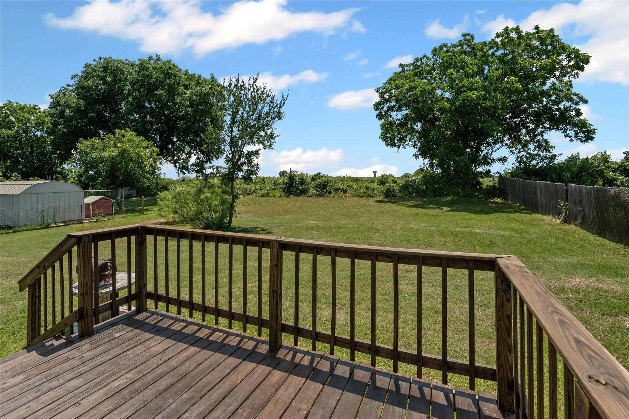 Deck featuring an outdoor structure