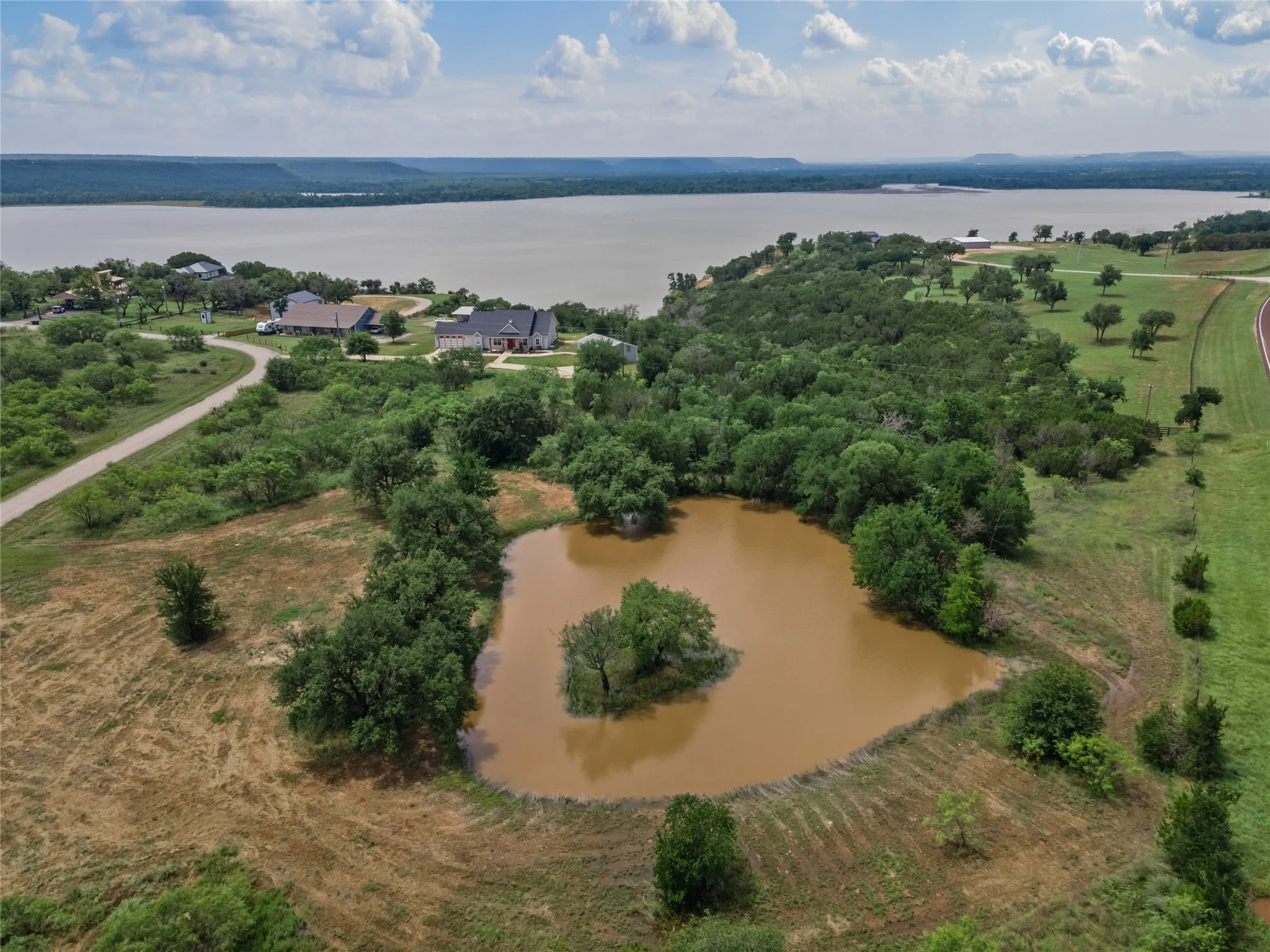 View of property location with a nearby body of water