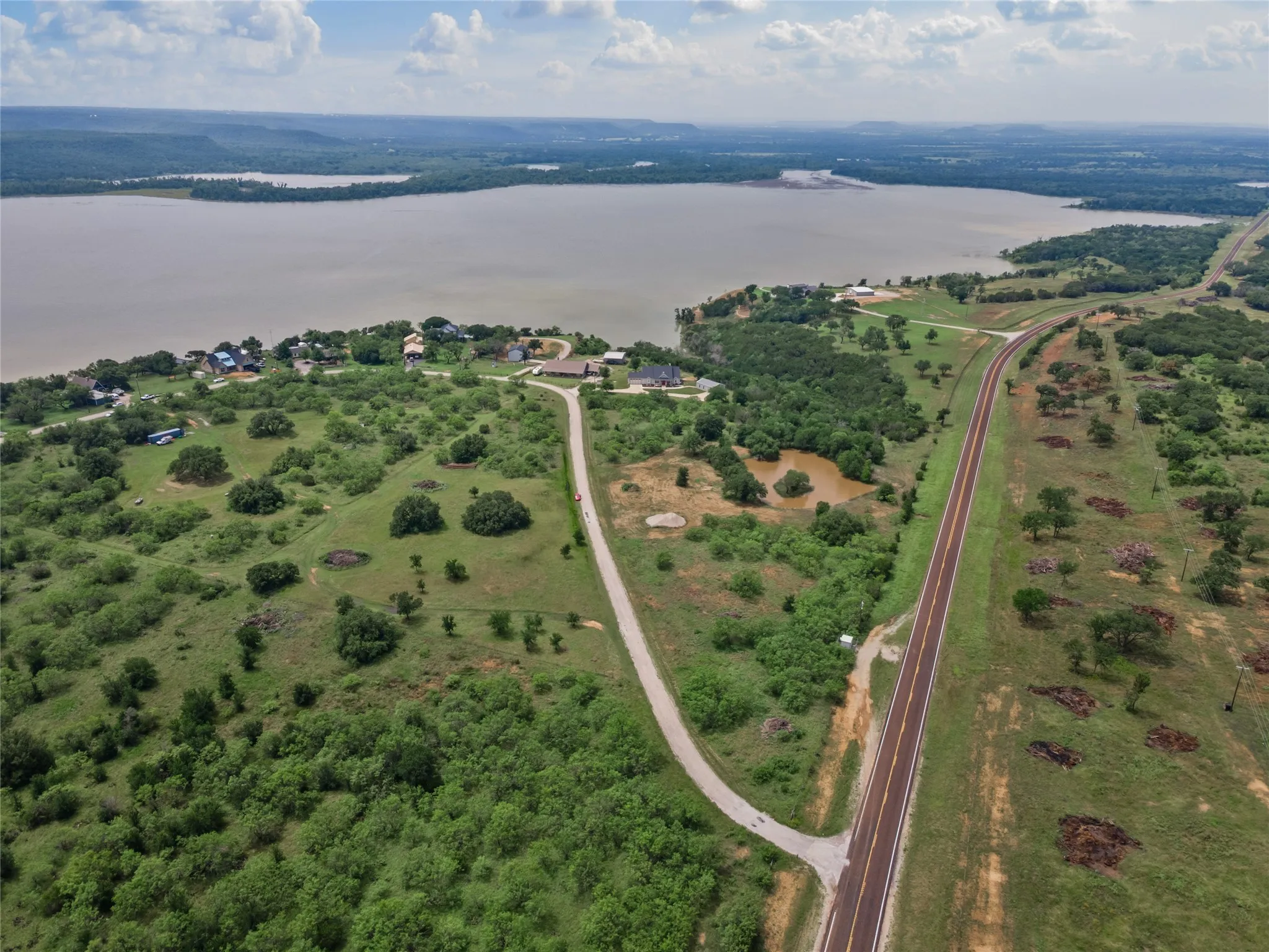 View of property location with a large body of water