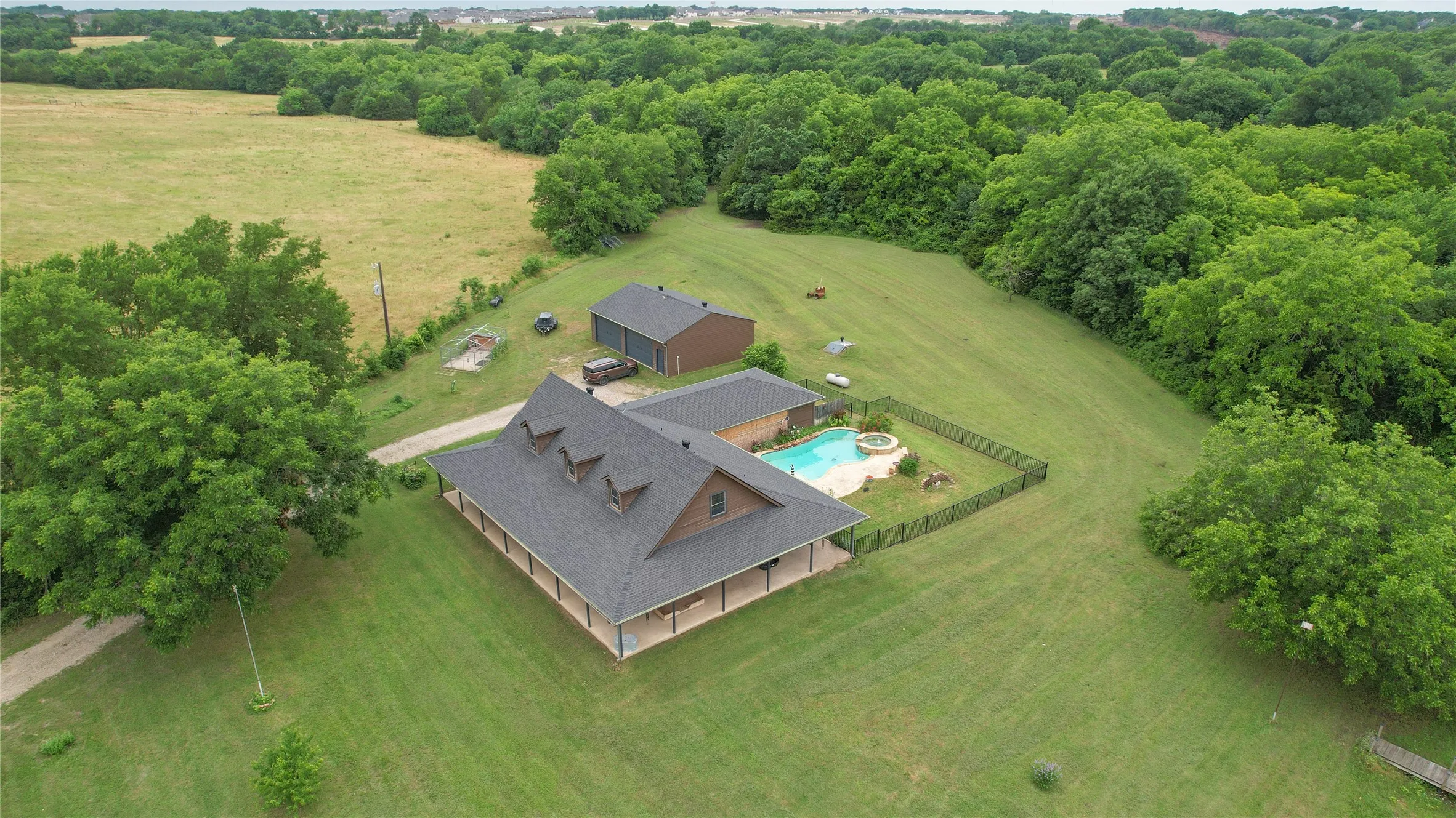 View of rural area with a pool