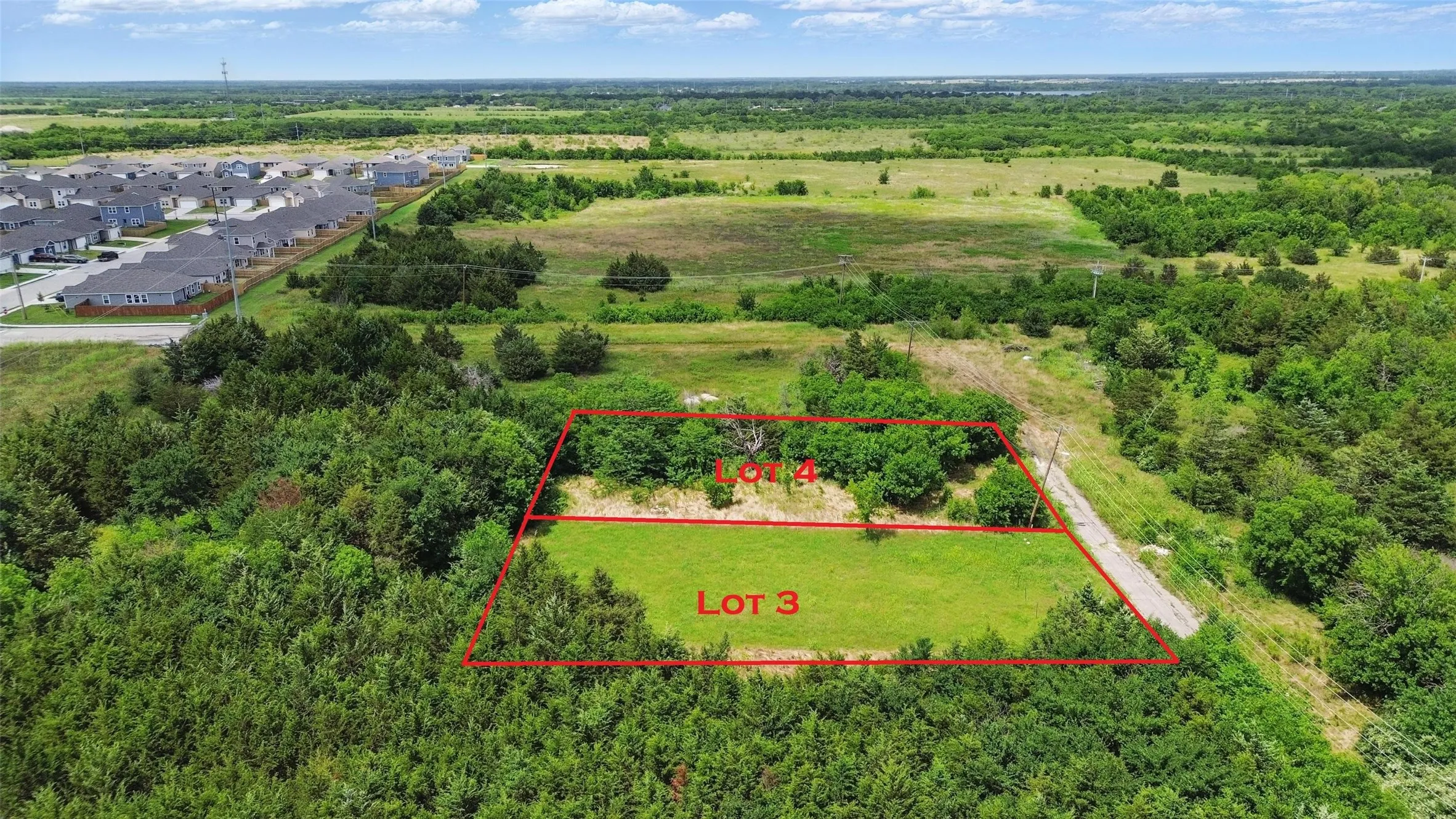 Aerial view of residential area with property parcel outlined
