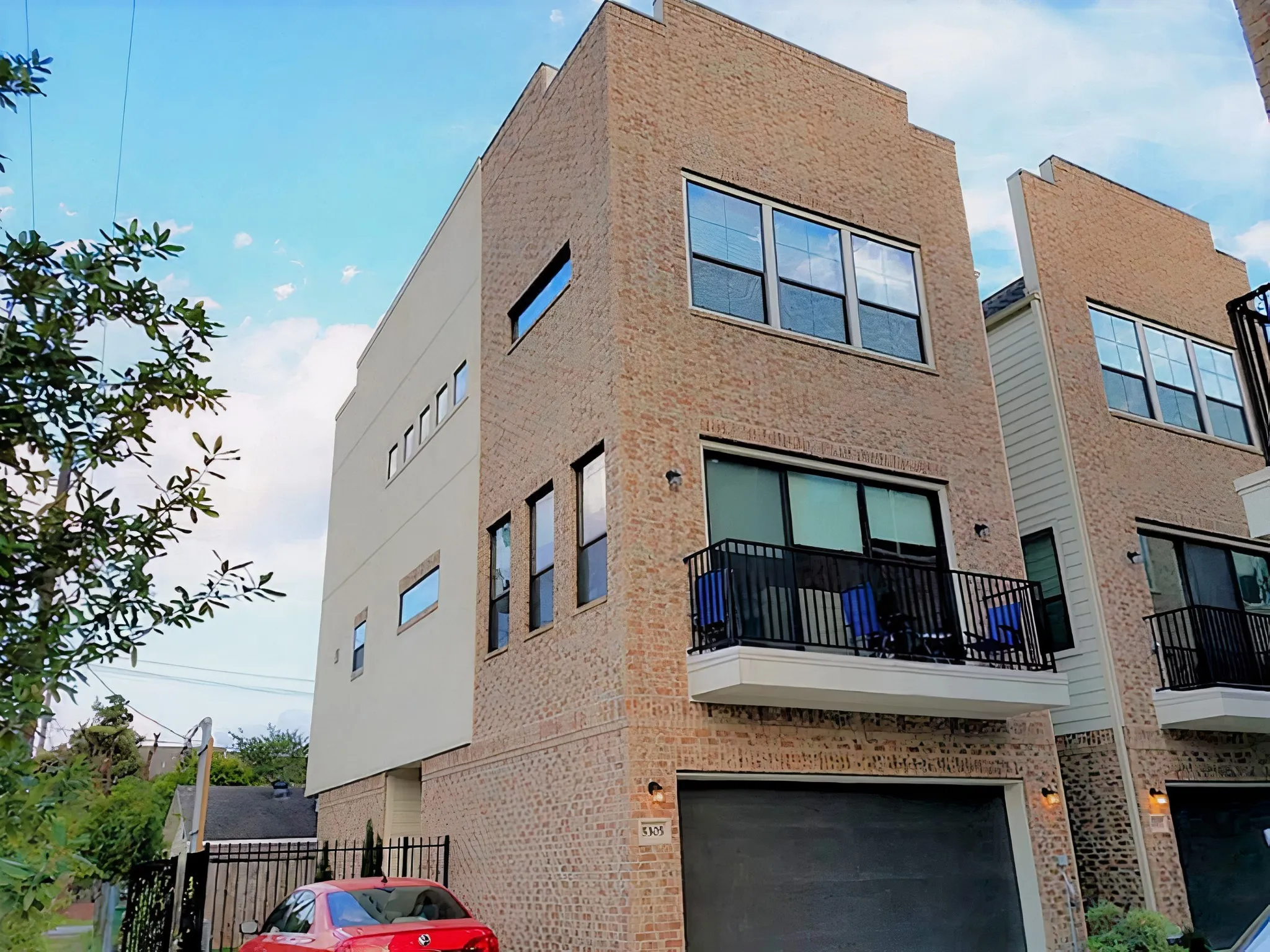 This corner lot home features a private entrance and ample yard space.