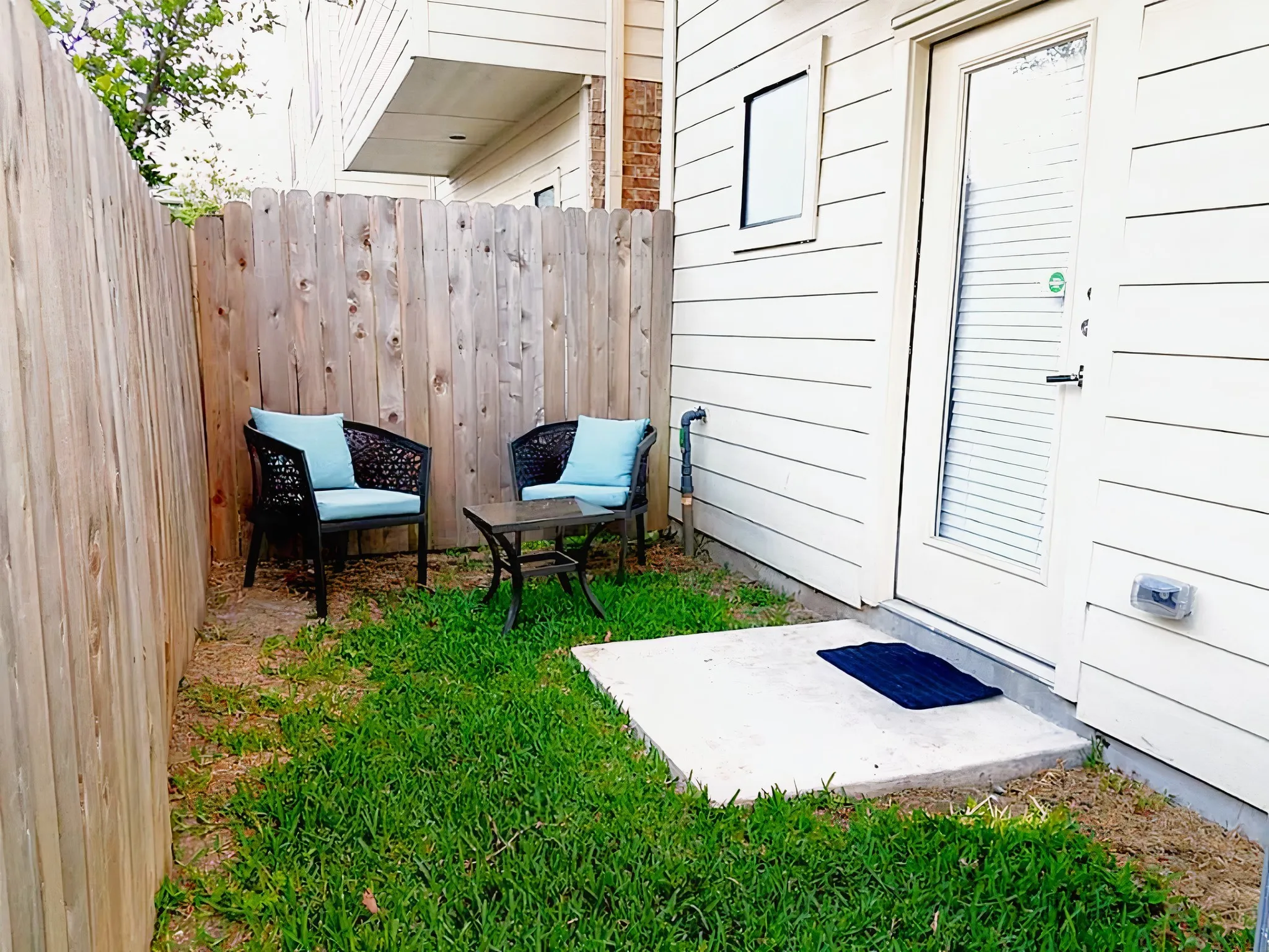 Backyard space for grilling and entertaining (no grass)