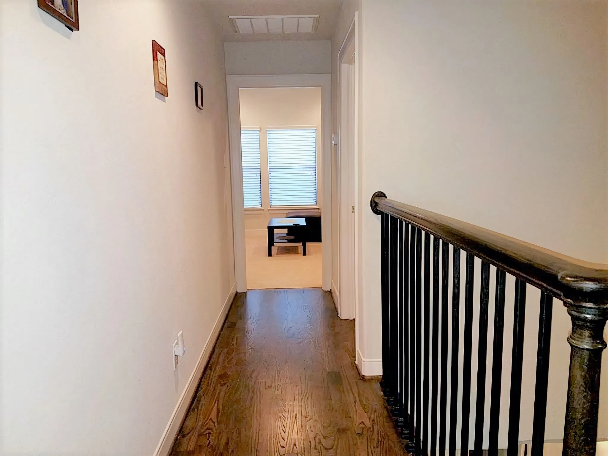 Corridor on the 3rd floor leading to the secondary bedroom and the laundry room.