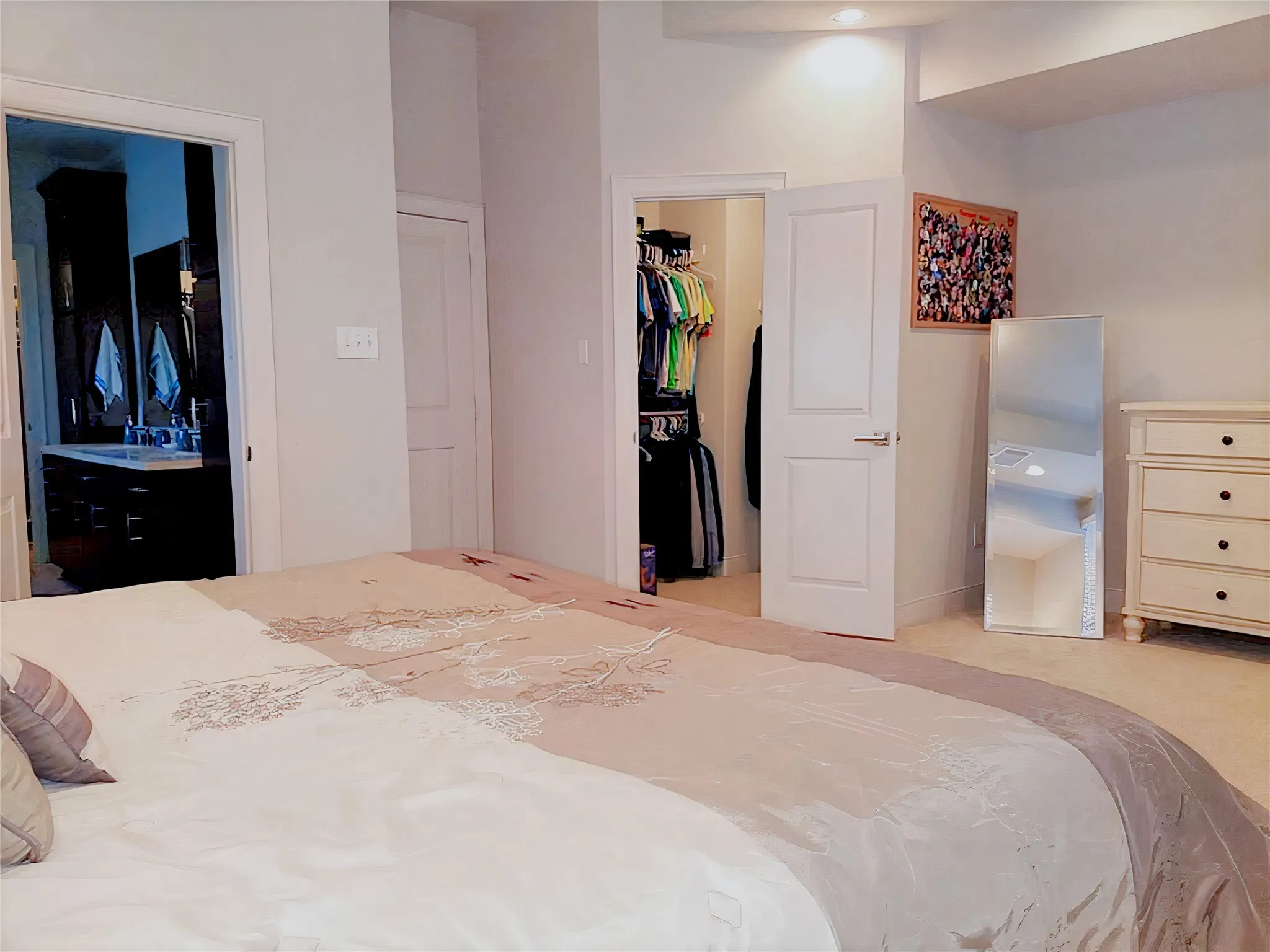 The primary bedroom has lots of natural lighting to greet you in the morning.