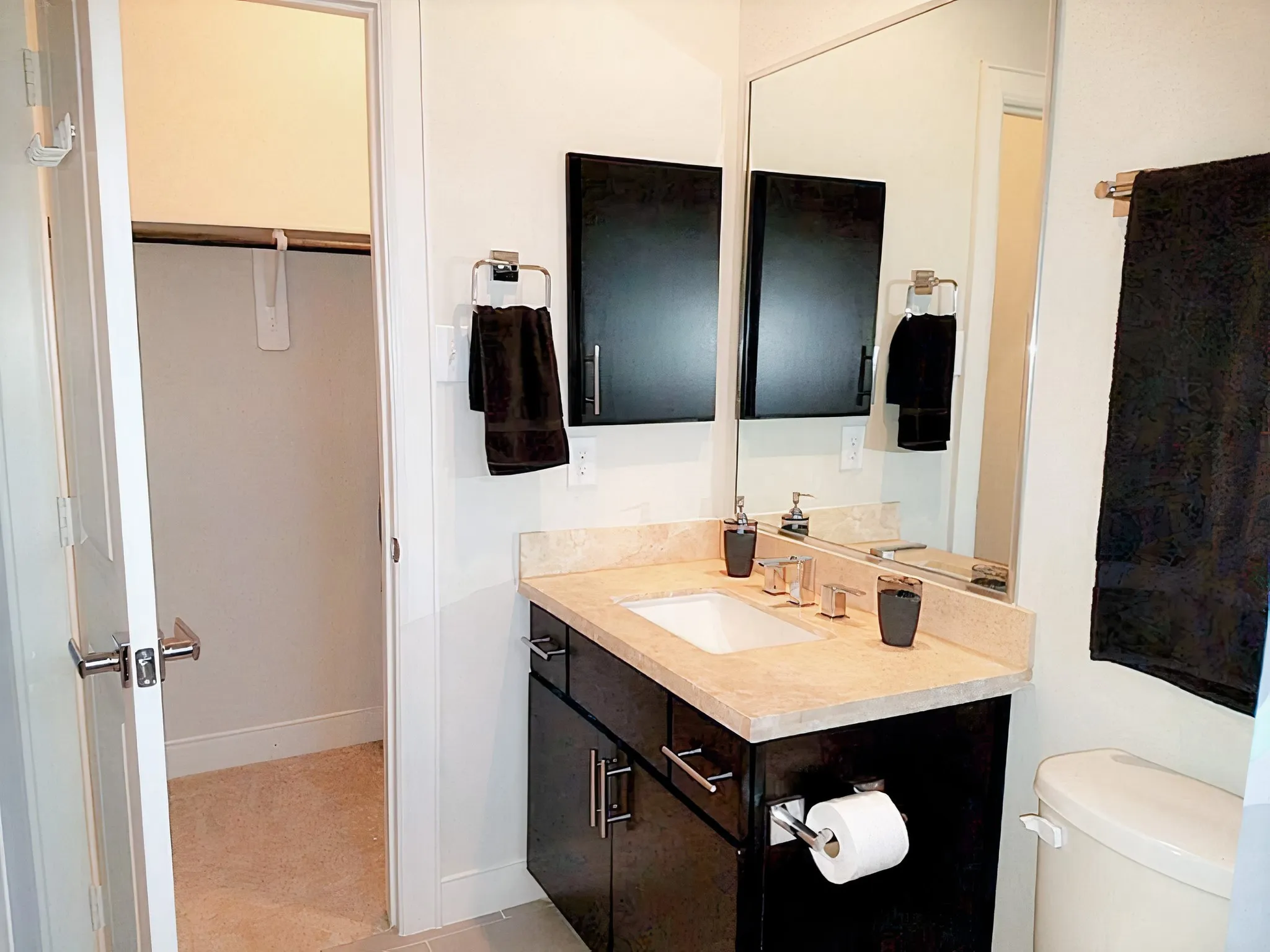The private bathroom on the 3rd floor with a tub and walk in closet