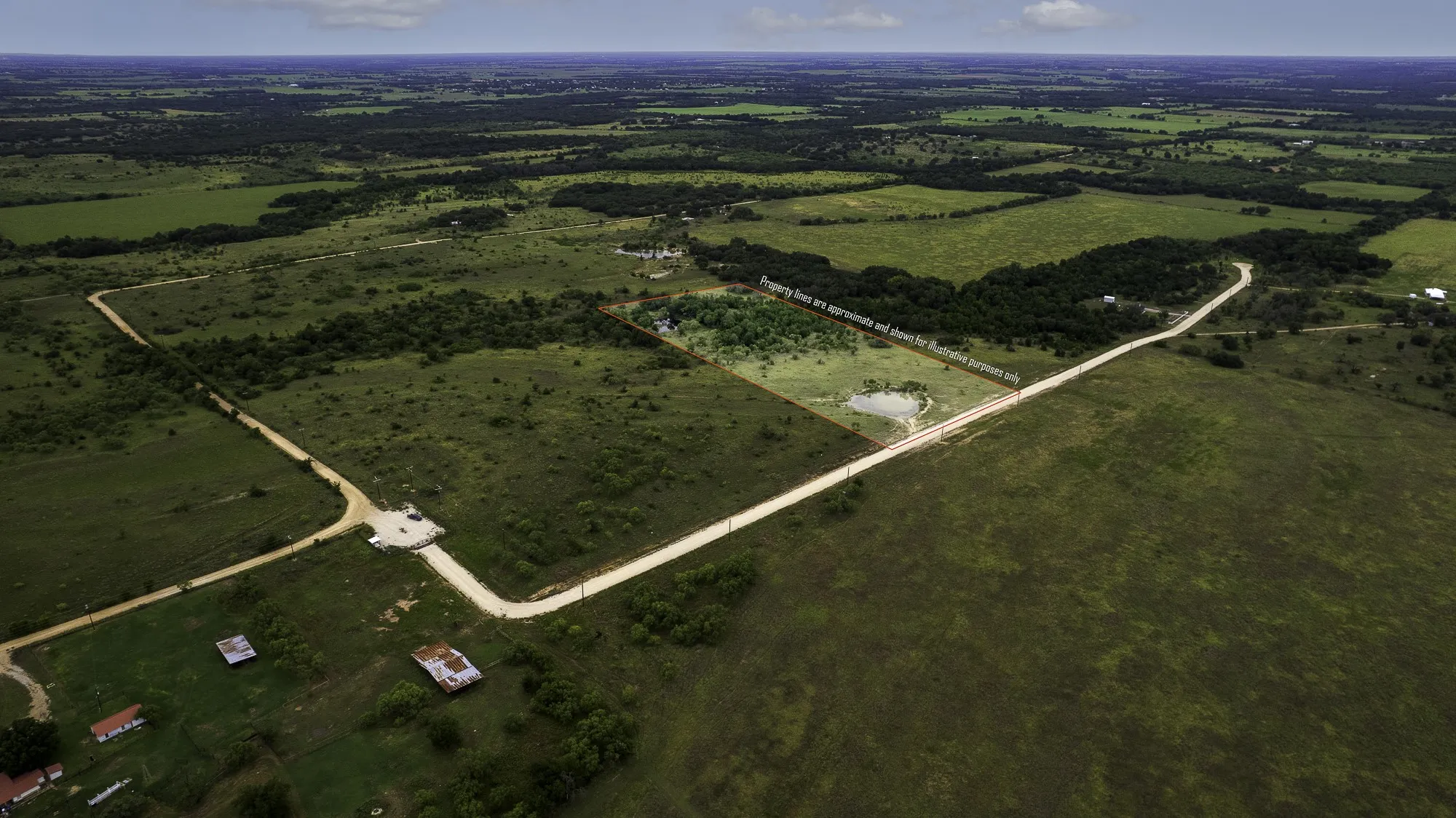 Aerial overview of property's location with rural landscape