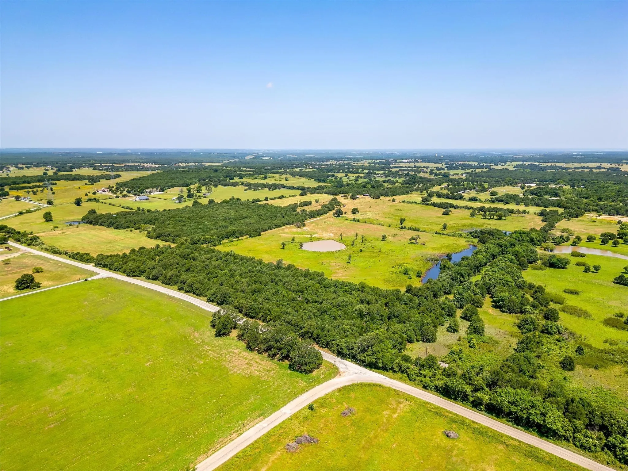 Overview of rural landscape with a large body of water