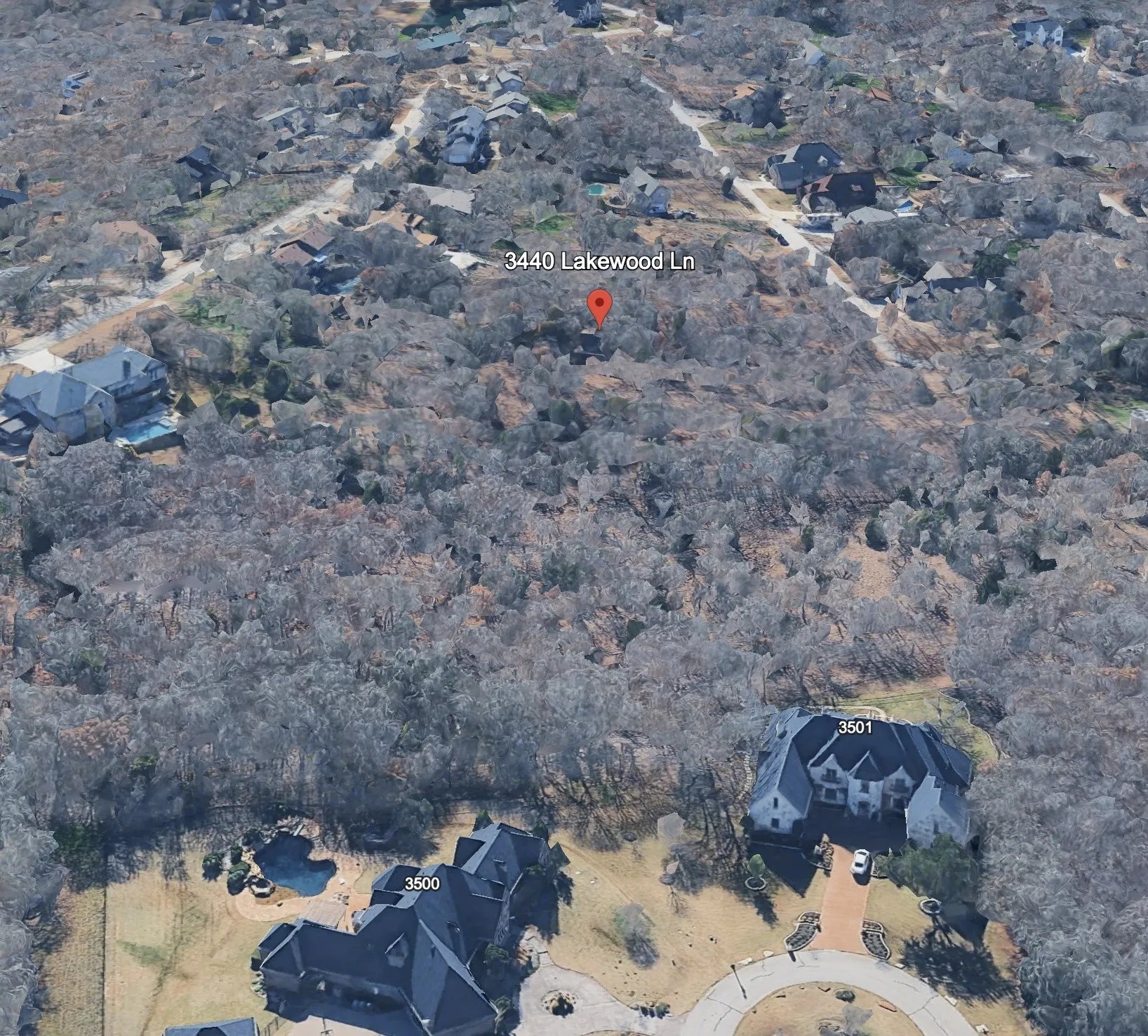 View of property location featuring nearby suburban area