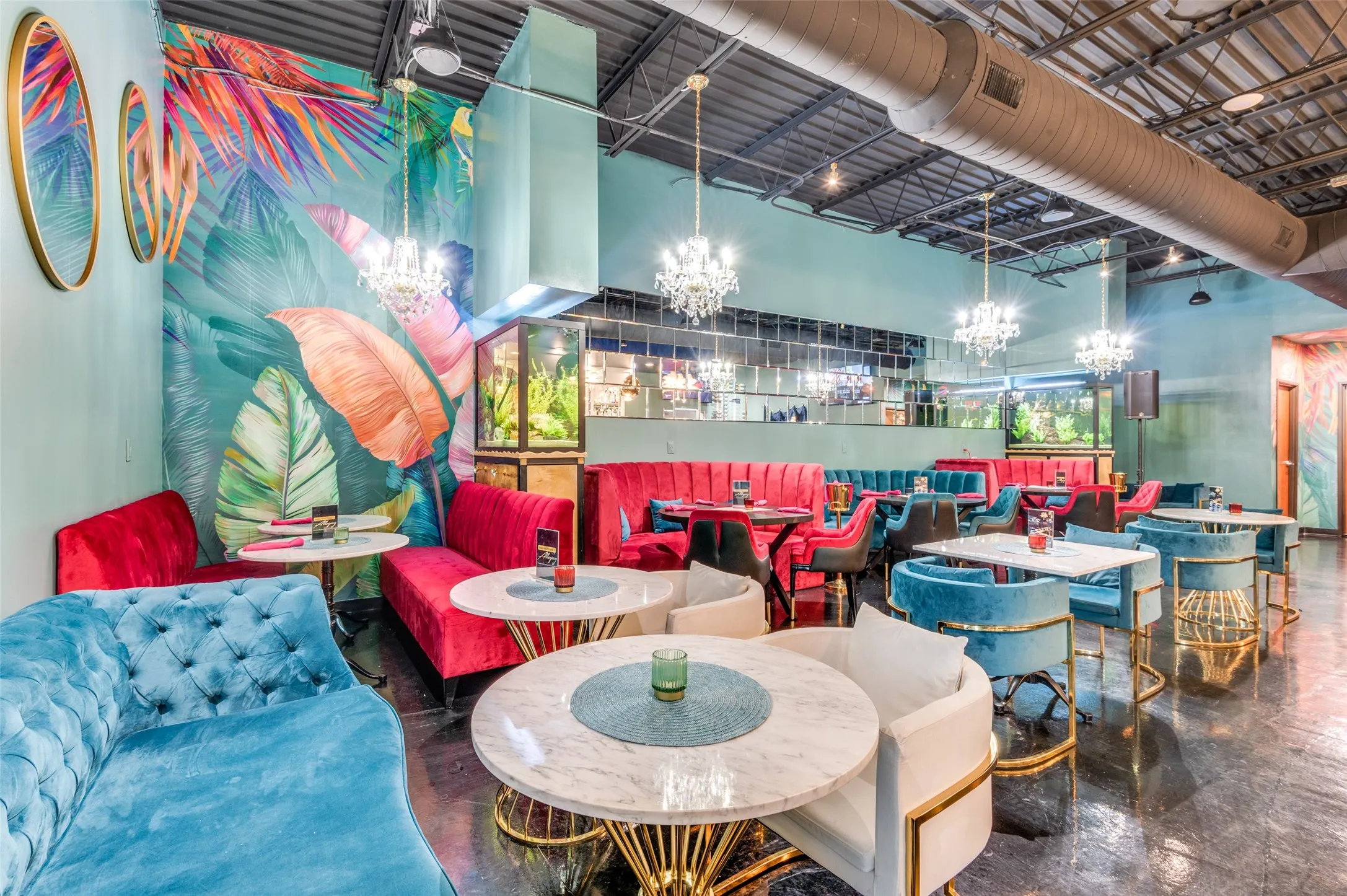Dining space with concrete floors and a high ceiling
