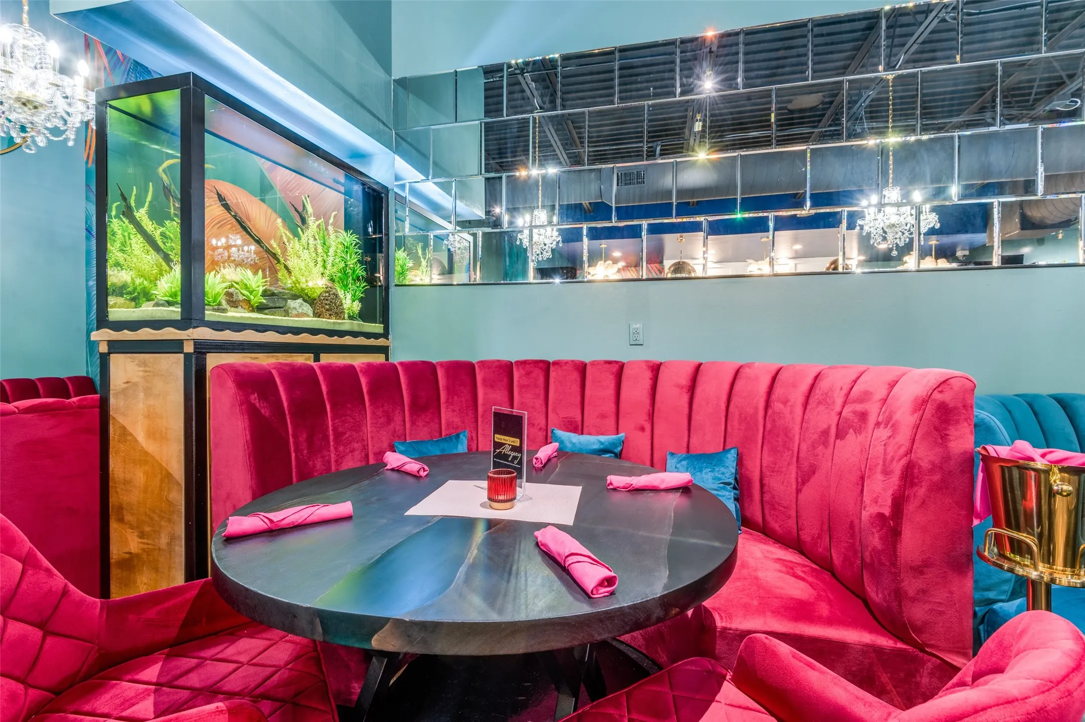 Dining space with concrete floors and a high ceiling