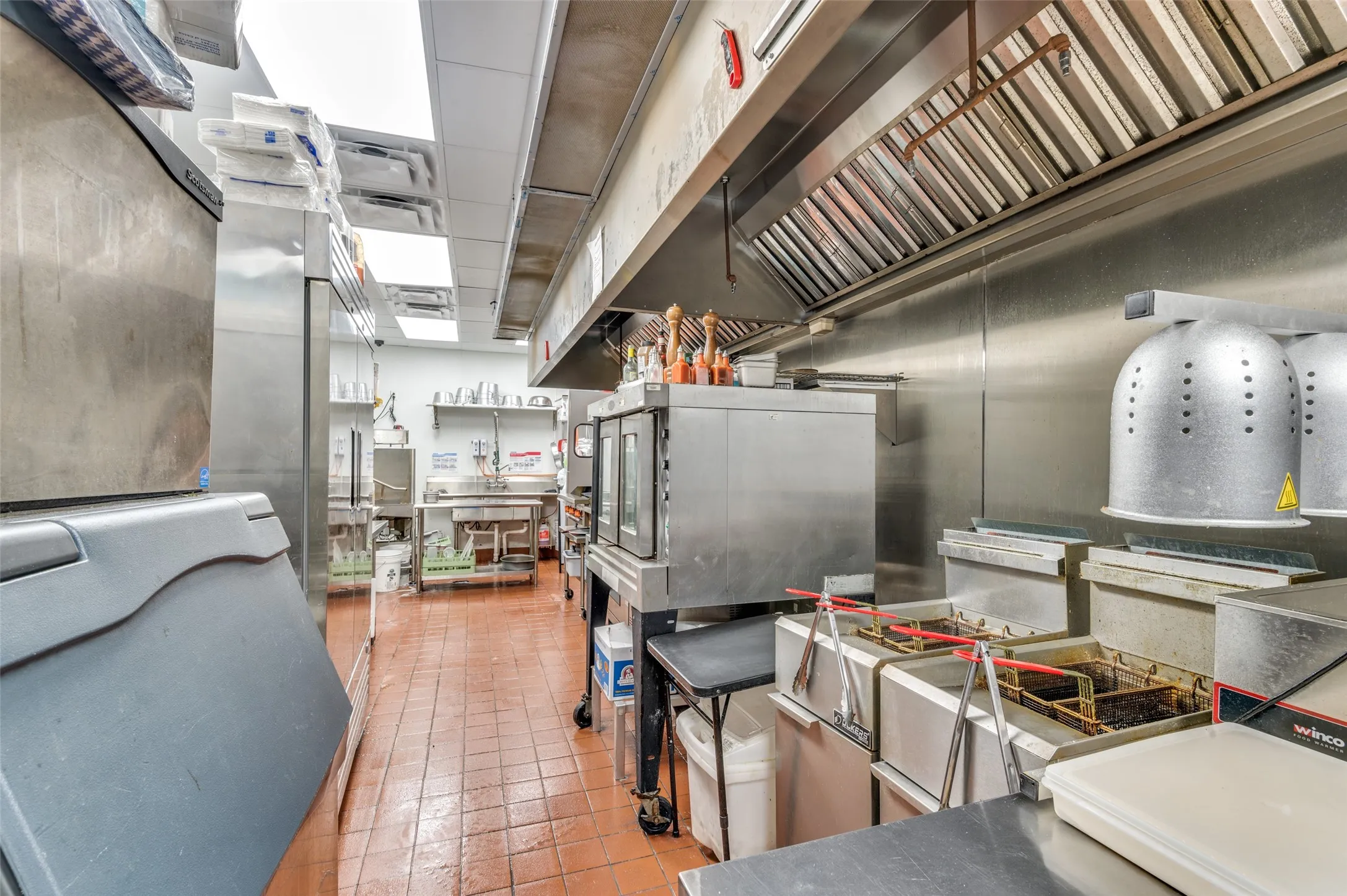 Kitchen with wall range hood