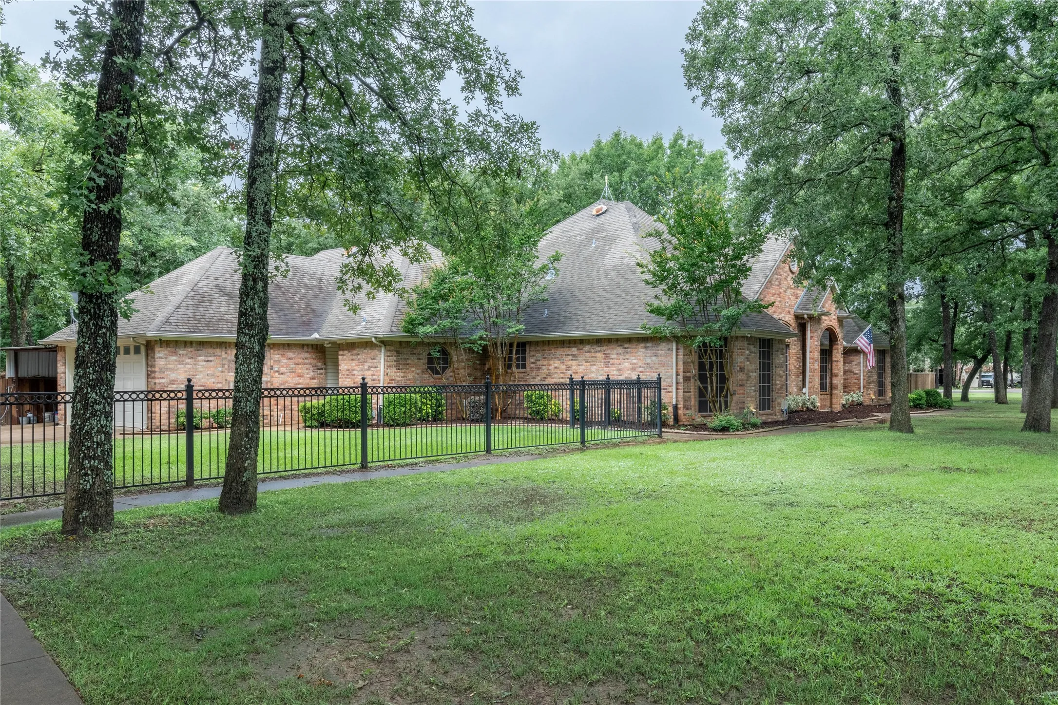 View of yard featuring a garage