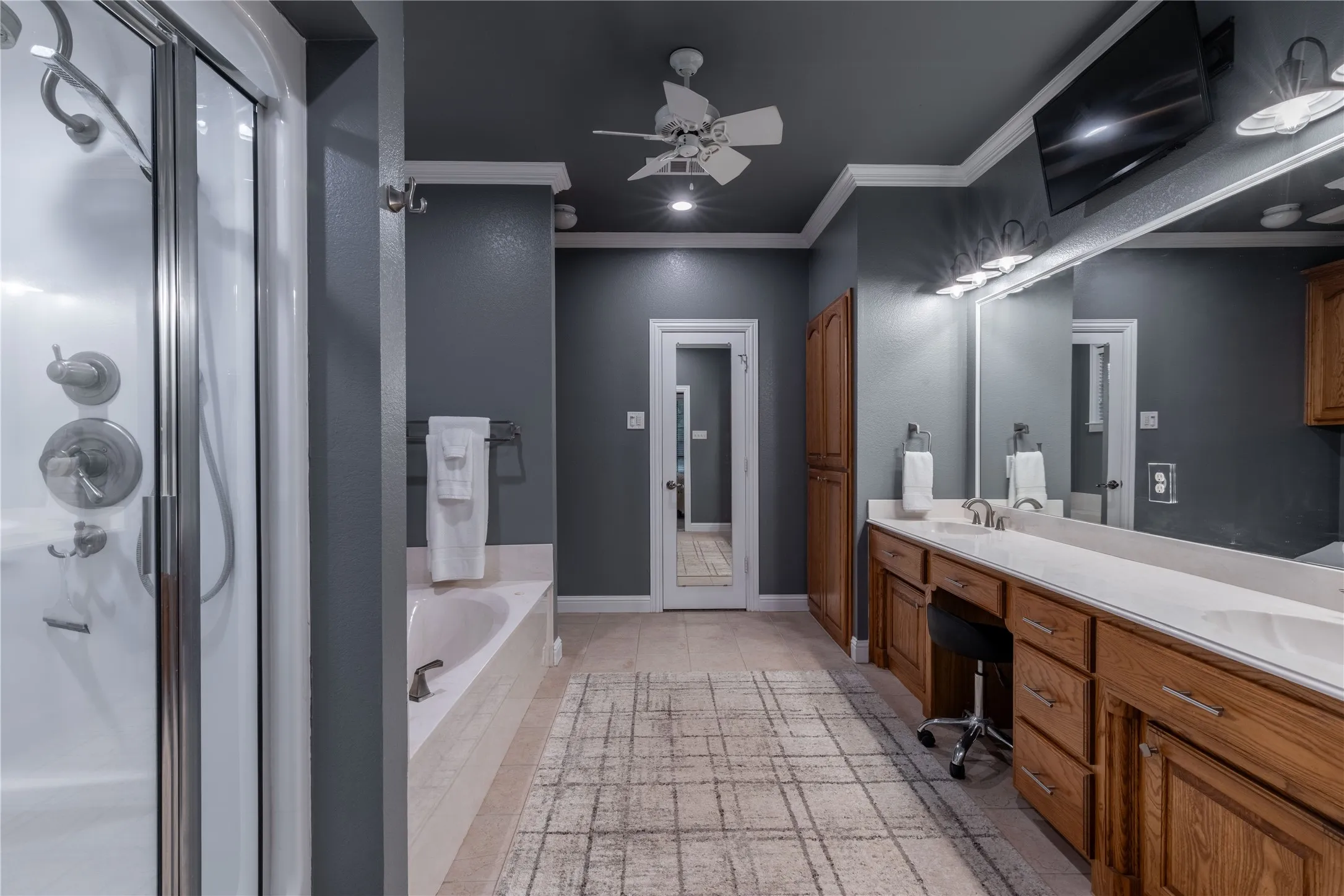 Second primary bathroom with ornamental molding, a whirlpool tub, a shower stall, tile floors, and recessed lighting
