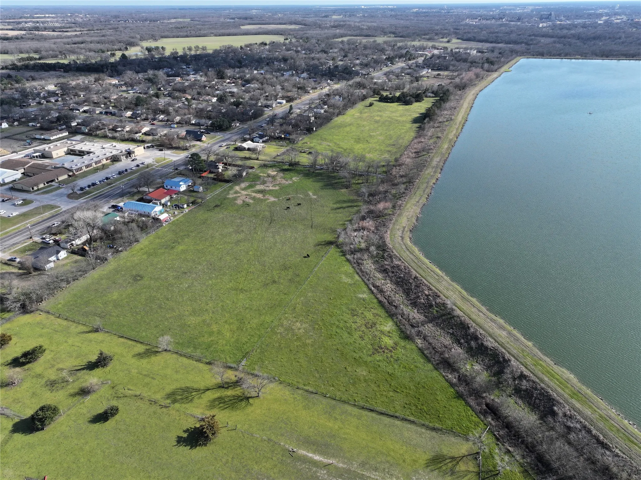 View of property location with a large body of water