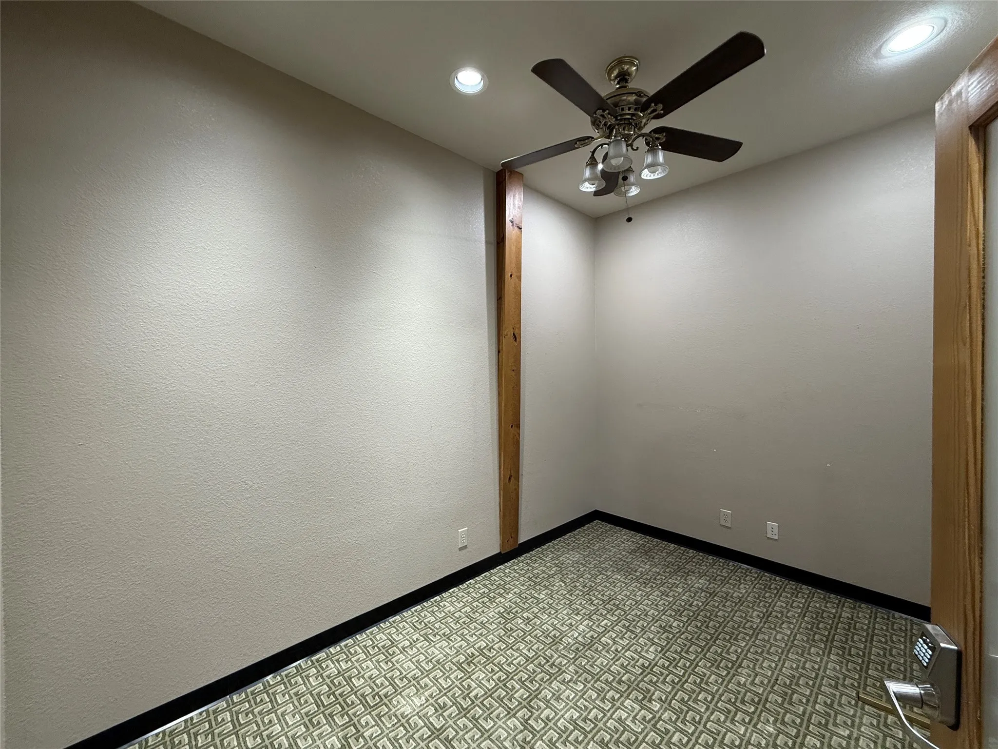 Unfurnished room featuring ceiling fan and recessed lighting
