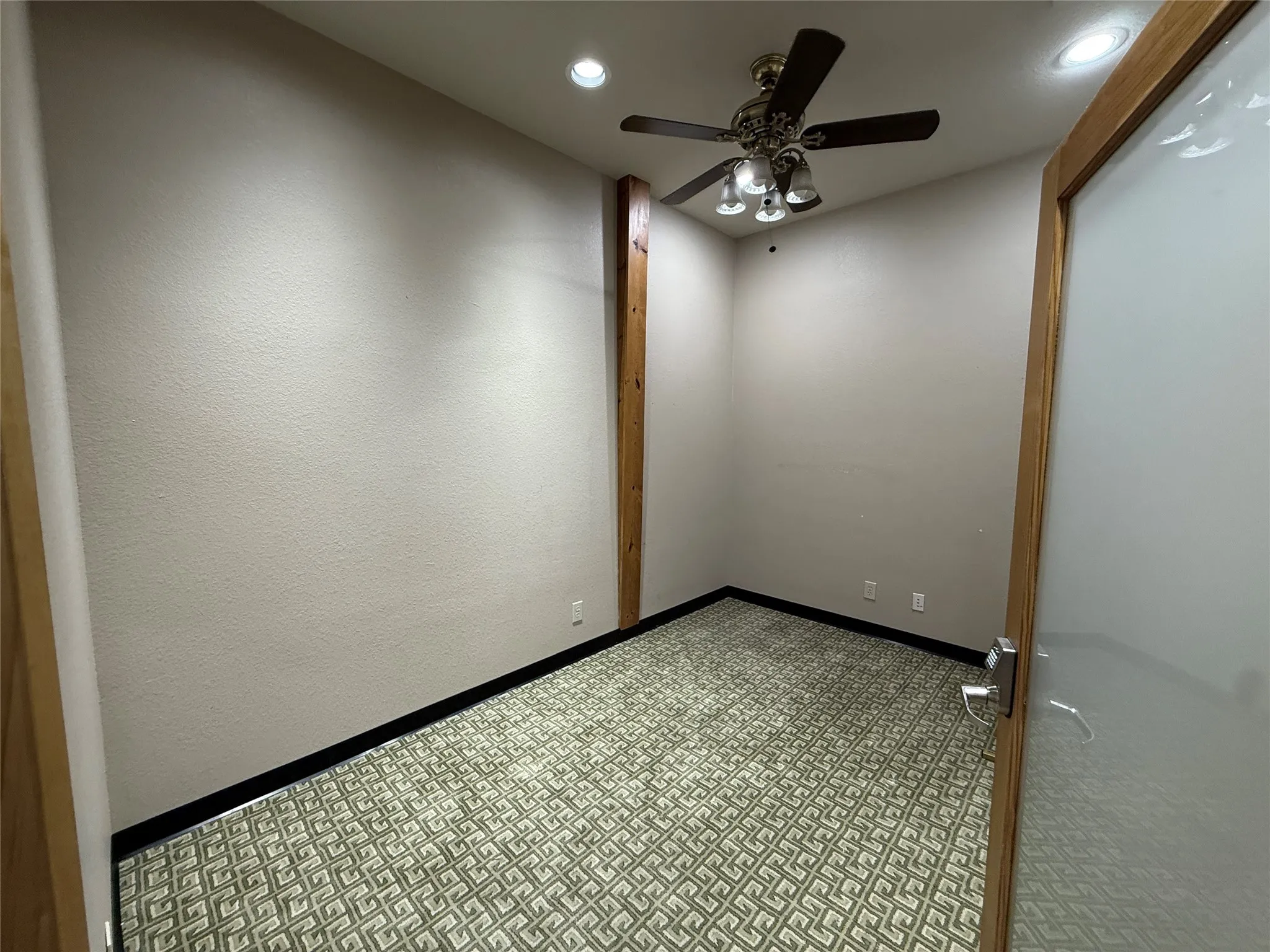 Spare room with ceiling fan and recessed lighting