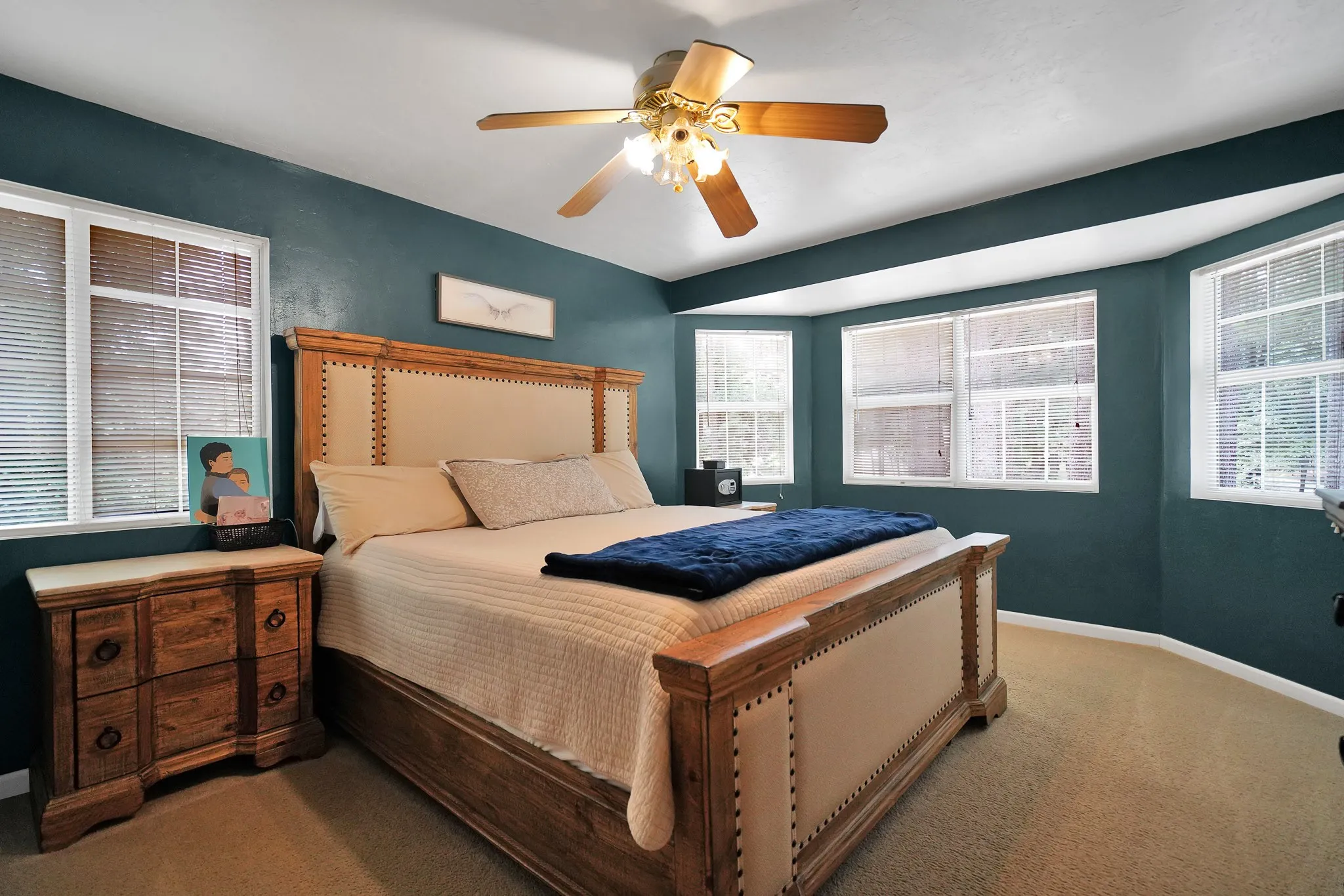 Bedroom featuring carpet flooring and ceiling fan