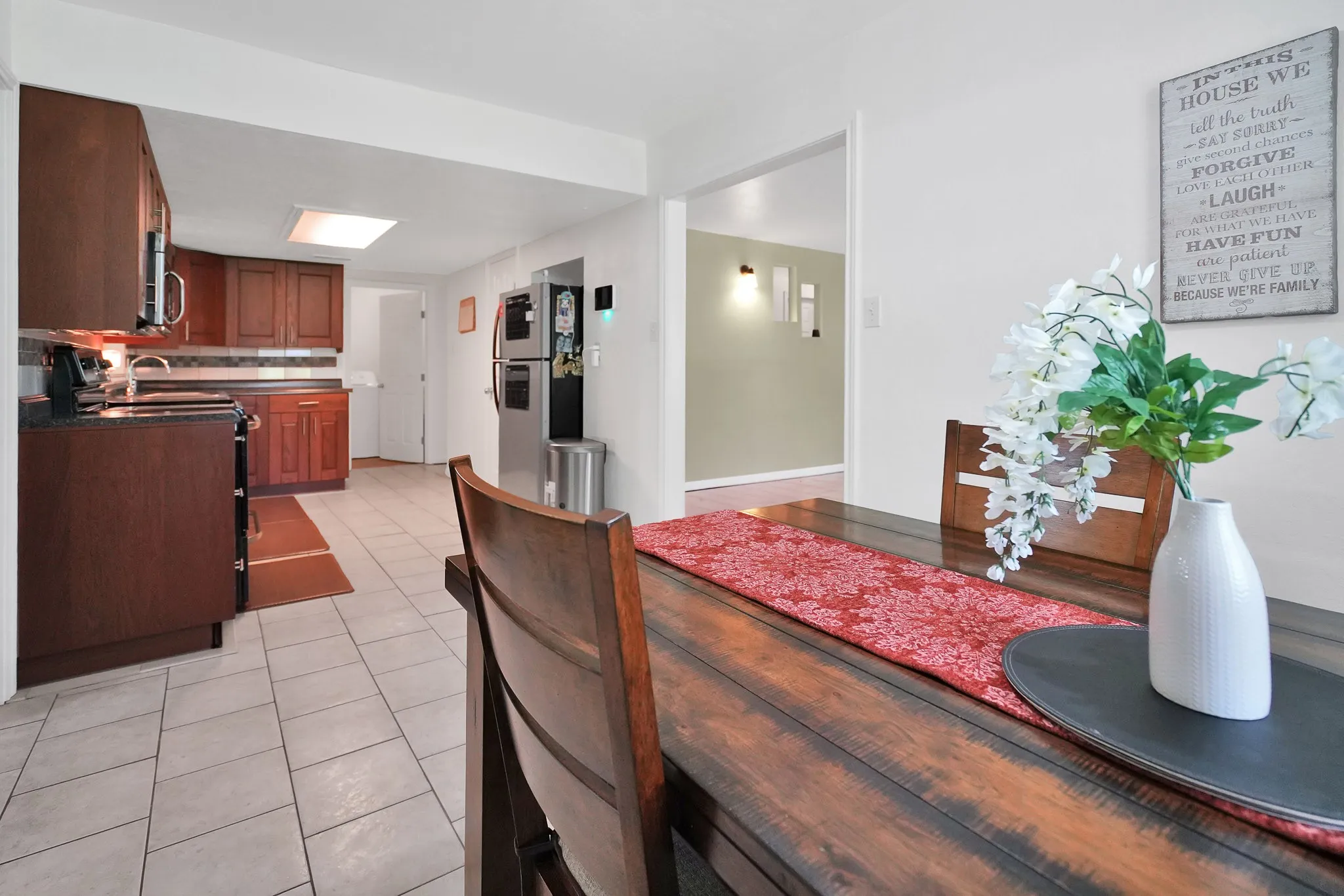 Dining area featuring light tile patterned floors