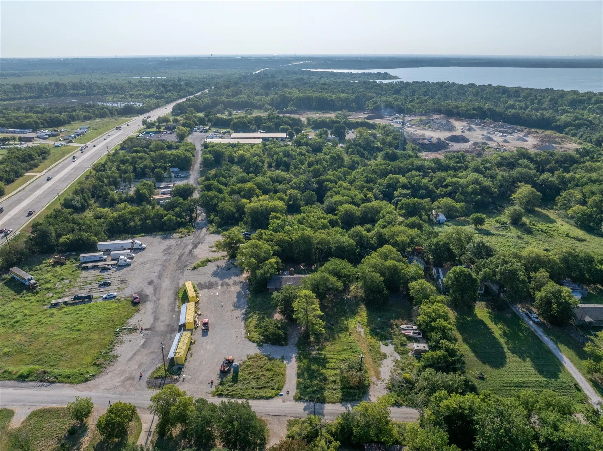 Aerial overview of property's location featuring a nearby body of water