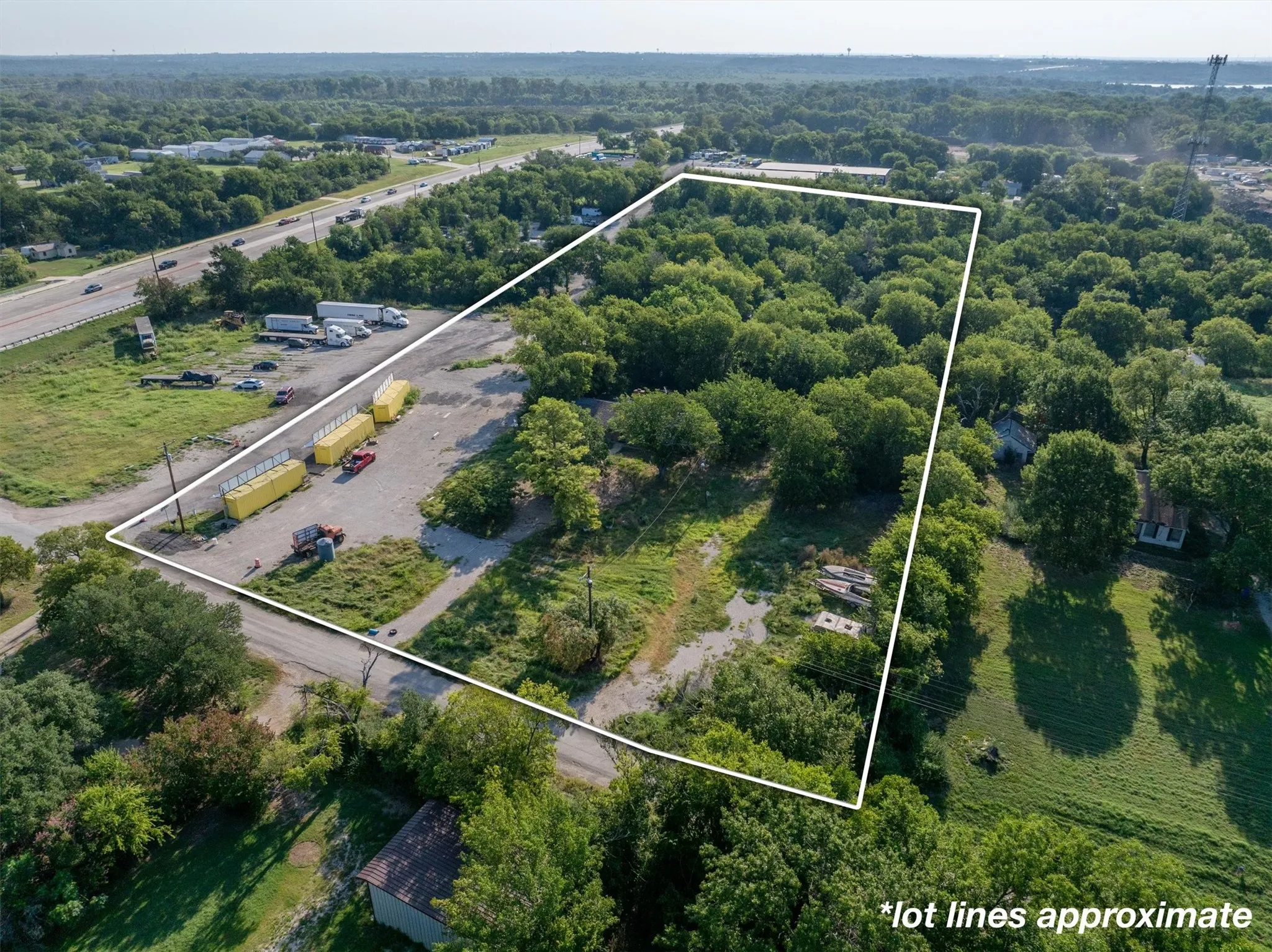Aerial view of property's location featuring property parcel outlined