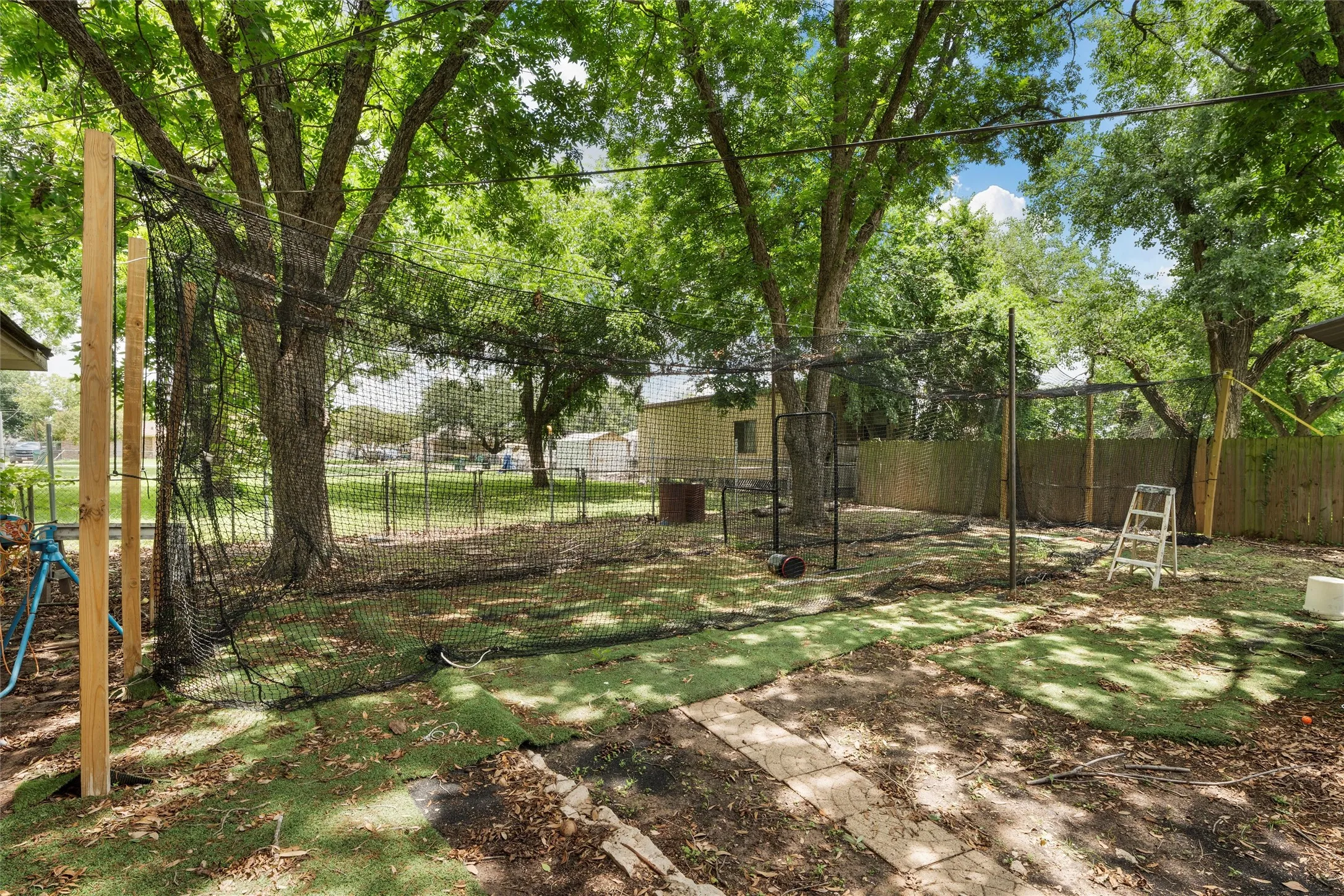 View of fenced backyard