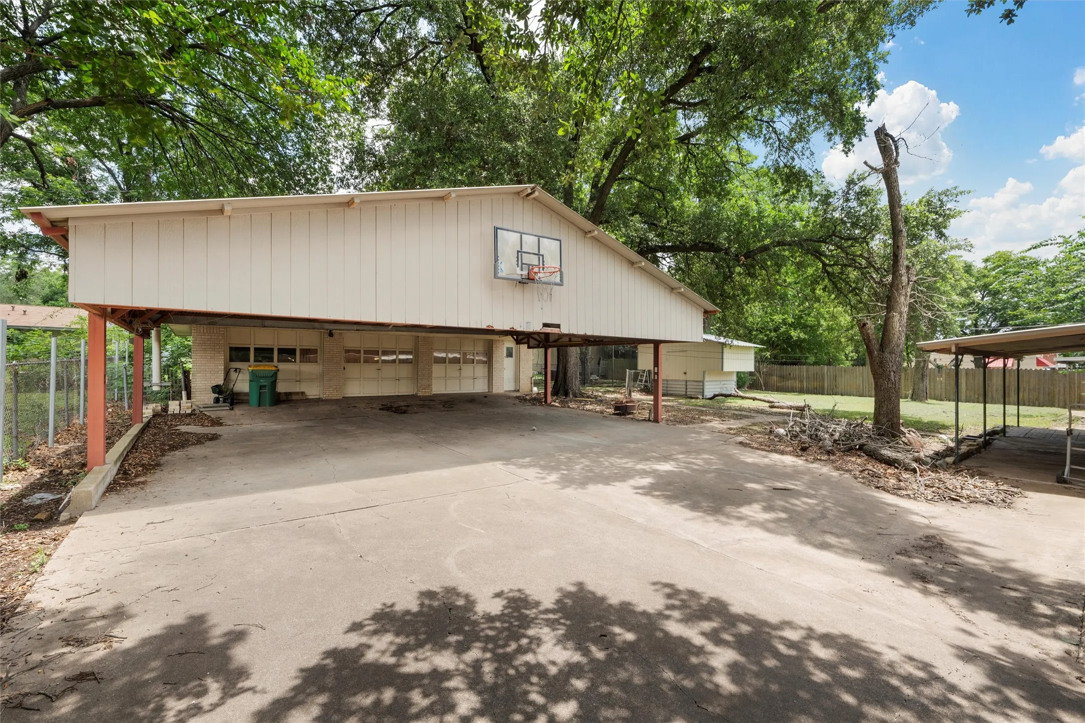 Garage featuring a detached garage