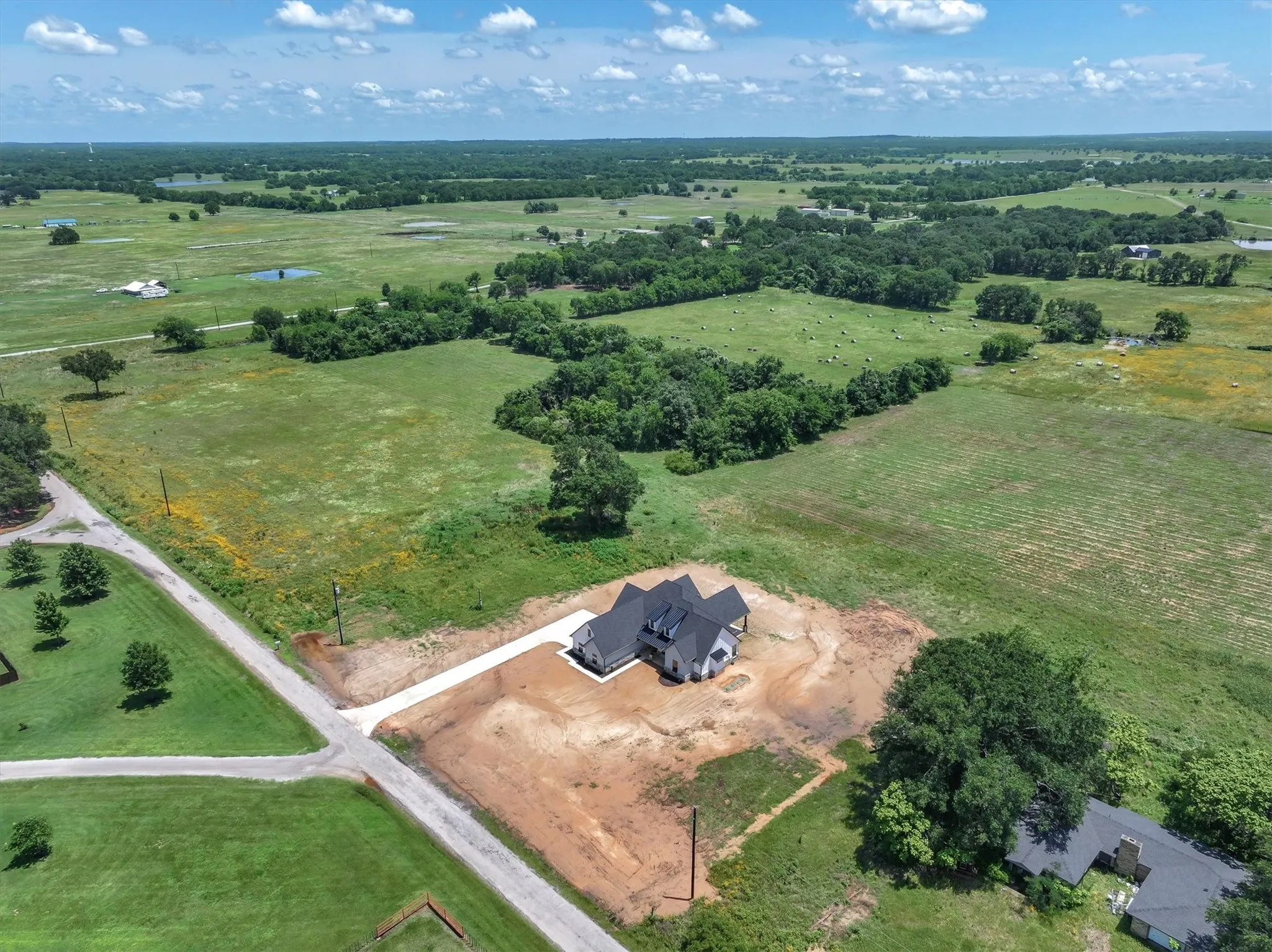 Aerial view of property's location with rural landscape