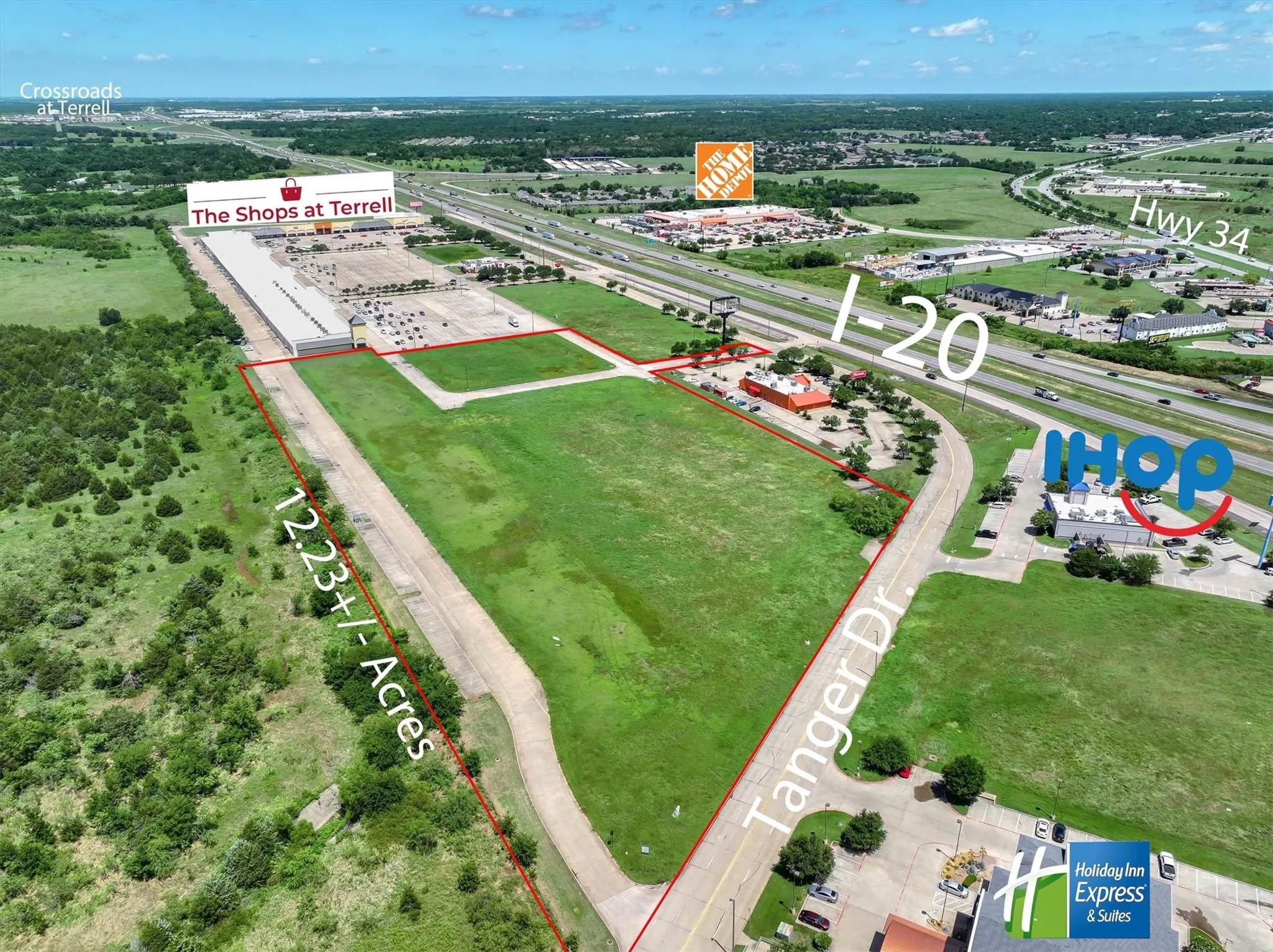 Aerial view of property's location with industrial structures and property parcel outlined