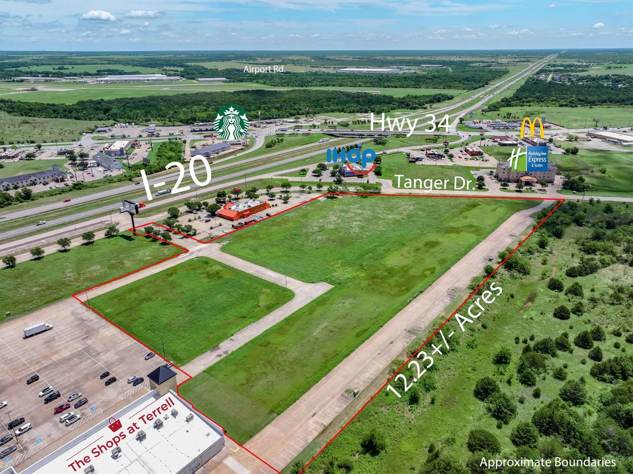 Aerial view of property and surrounding area with property parcel outlined
