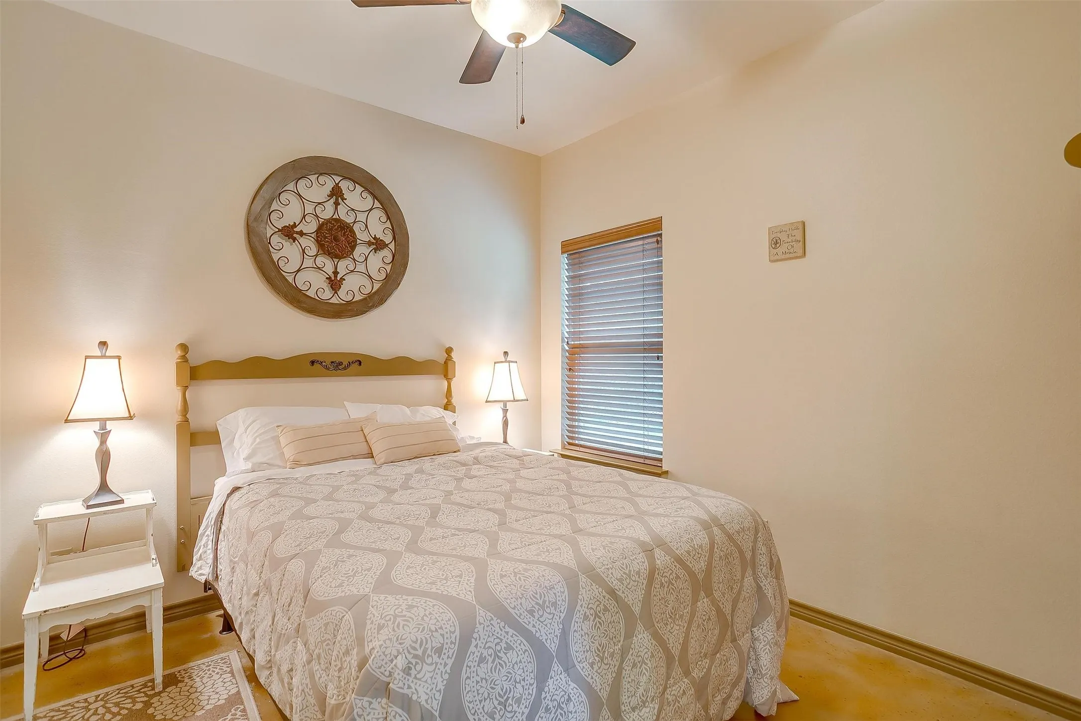 Sun Rise Cabin- 1st Bedroom featuring baseboards and ceiling fan