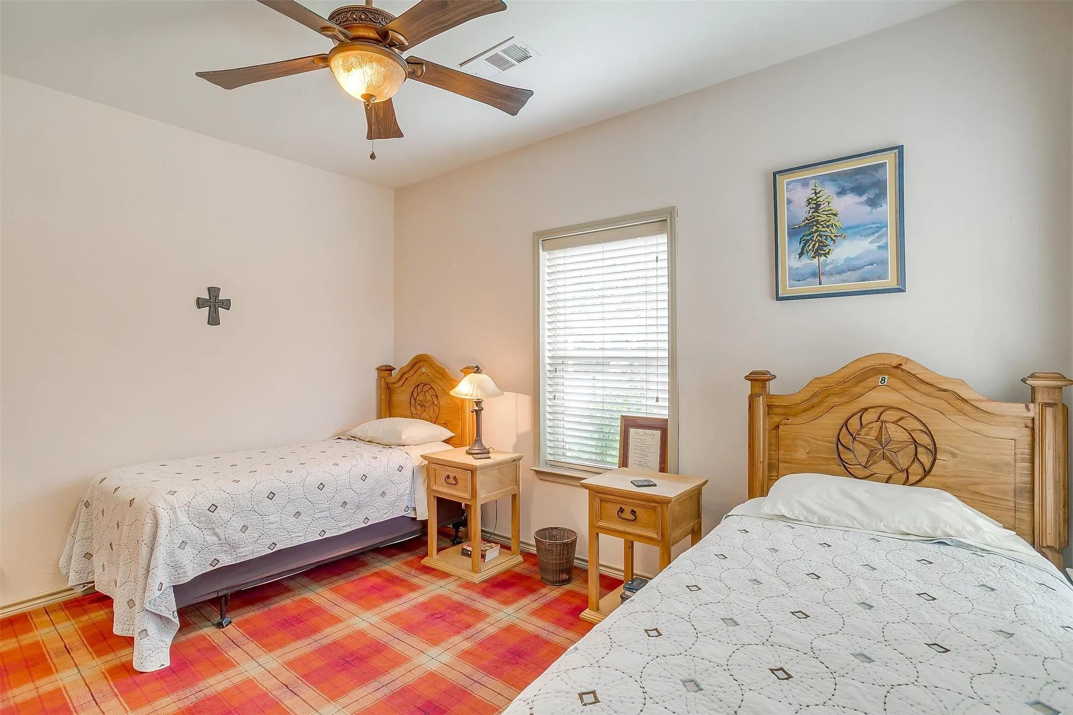 Still Water Cabin- downstairs Bedroom with ceiling fan
