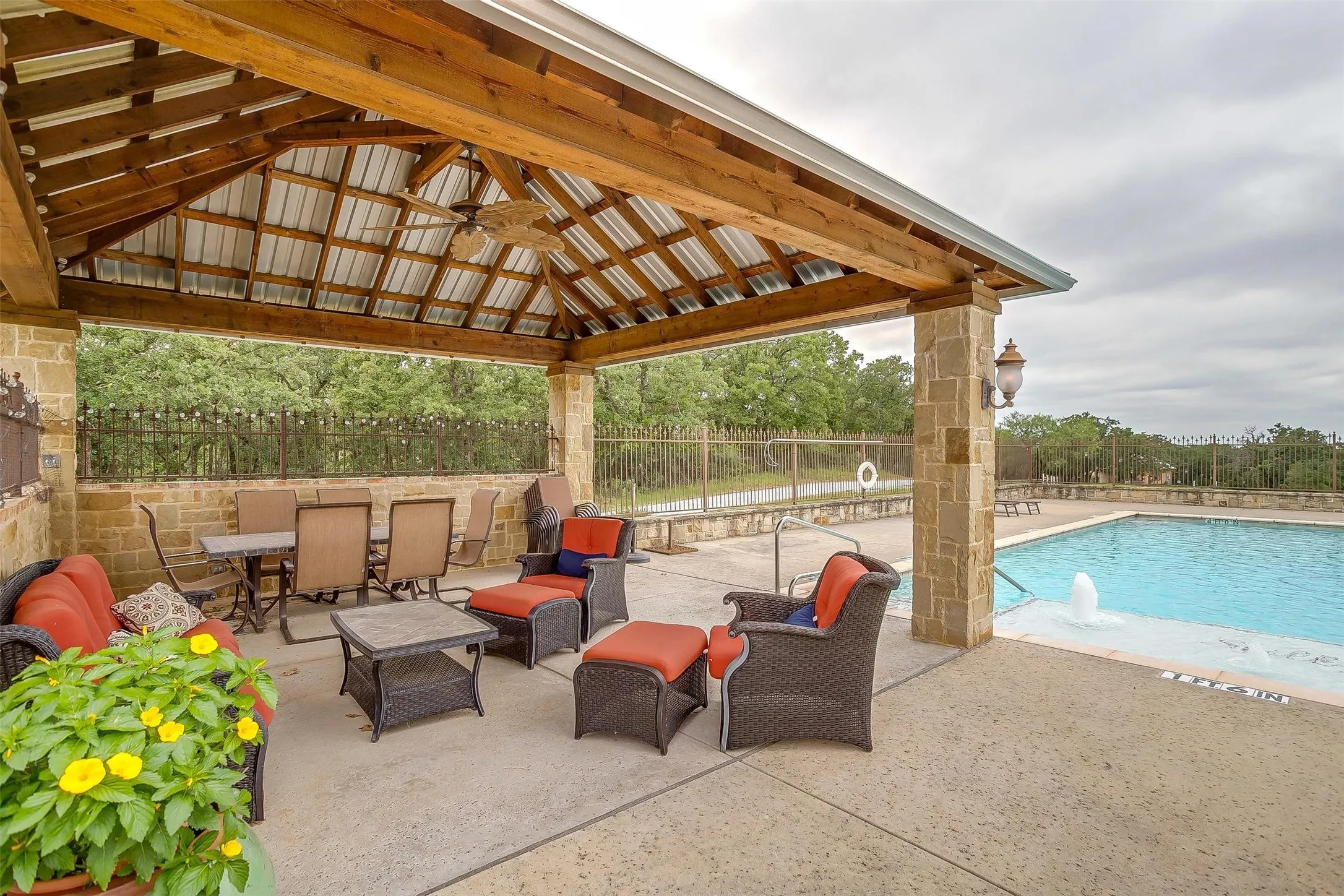 Community pool featuring a patio