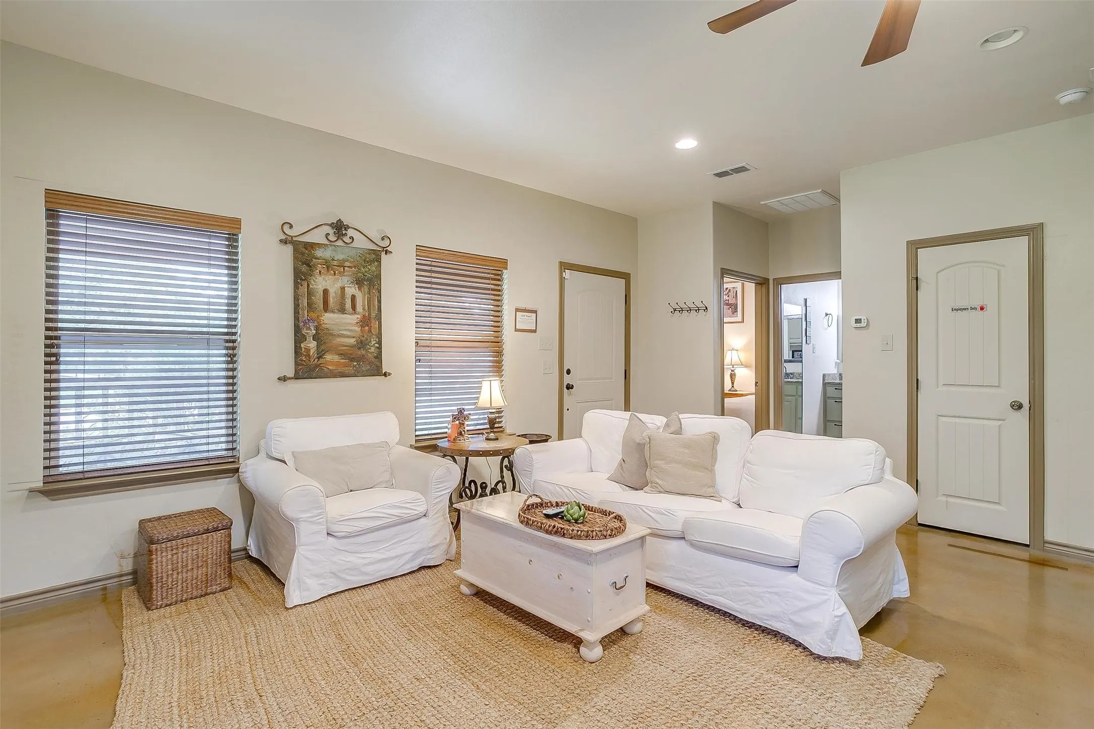 Sun Rise Cabin-Living room with concrete flooring, ceiling fan, and recessed lighting