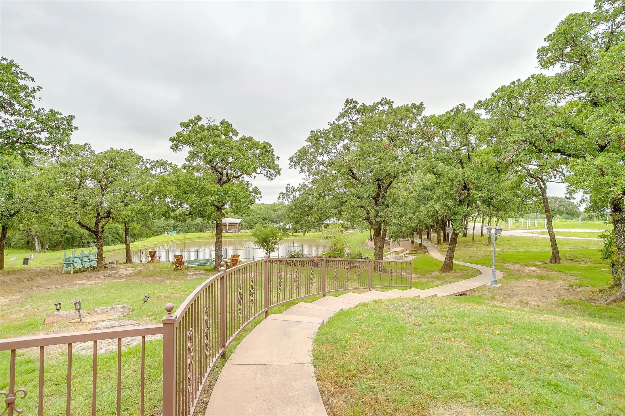 View of pathway from Still Water Cabin to event center (overlooking pond)