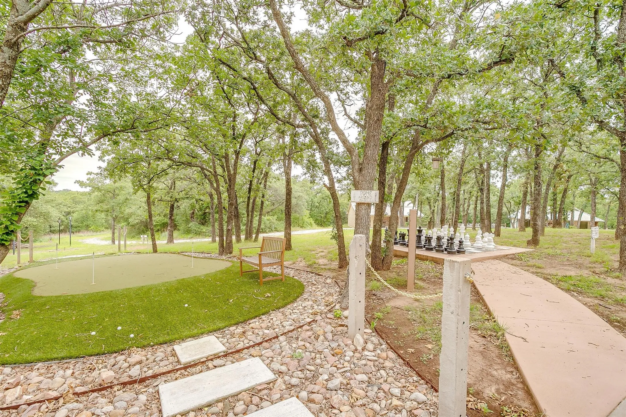 View of yard featuring an area to practice putting