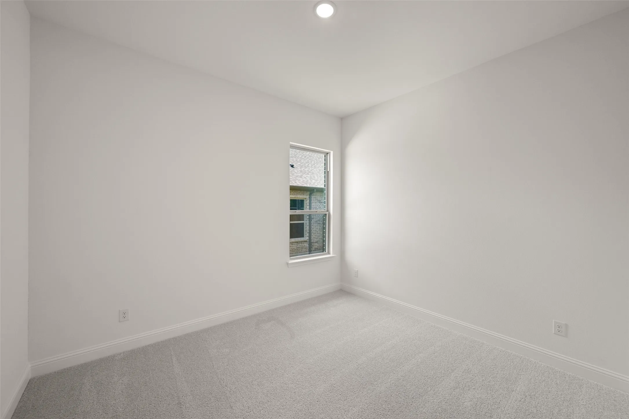 Unfurnished room with carpet and recessed lighting