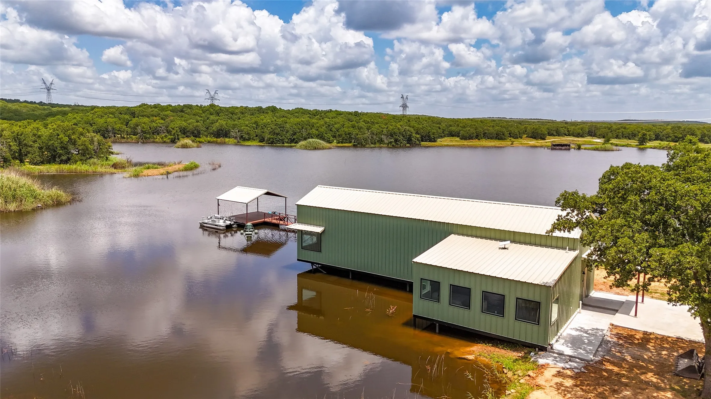 Water view with a floating dock