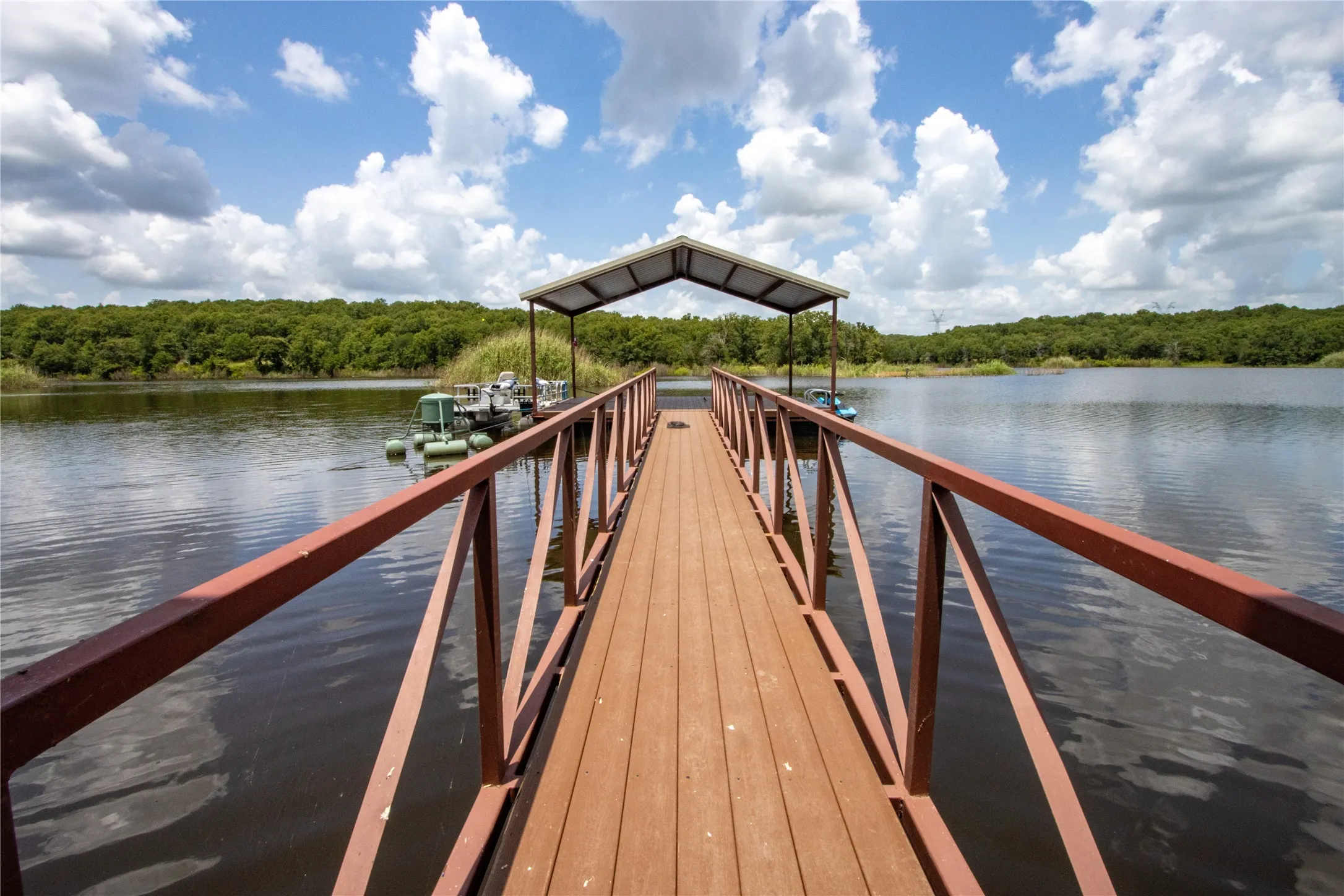 Dock featuring a water view