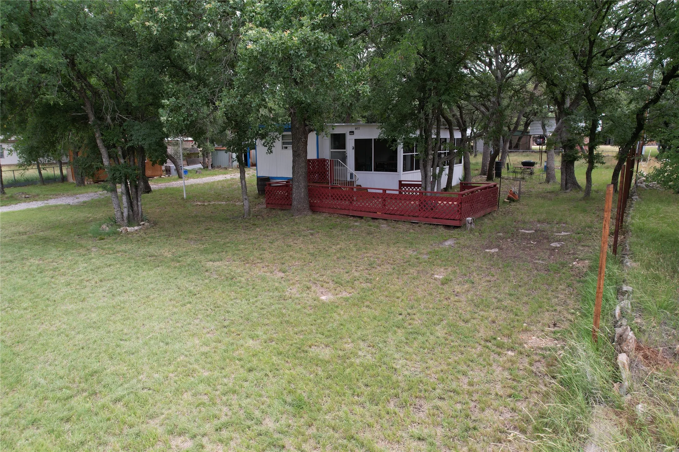Mobile Home For Sale in Brown County , 4411 Cherokee Drive, May, Texas 76857, 2 Bedroom, 2 Bathroom, Garage spaces, 648 Sqft, built in 0, mls#20979388, Real Estate Agent in May, Homes For Sale in Brown county, Homes For Sale in May, Realtor in May Texas, Real Estate Brokerage Independent Realty Texas, Luminita Cordes Realtor