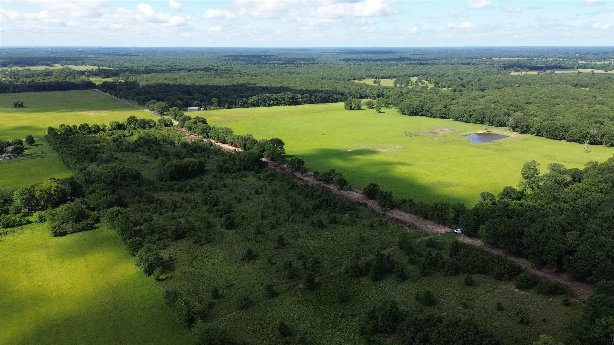 View of rural area featuring a forest