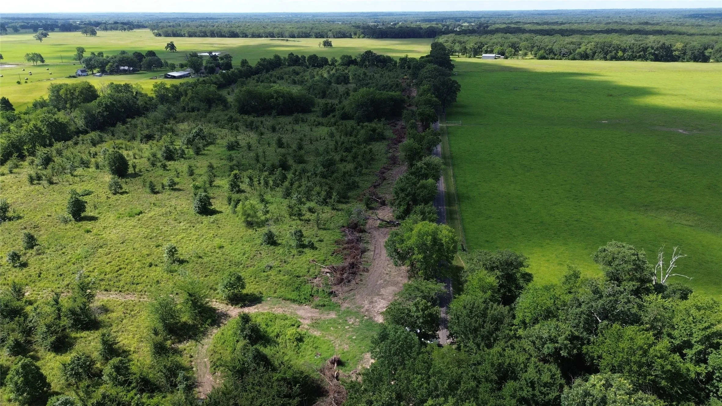Aerial view of property's location with rural landscape