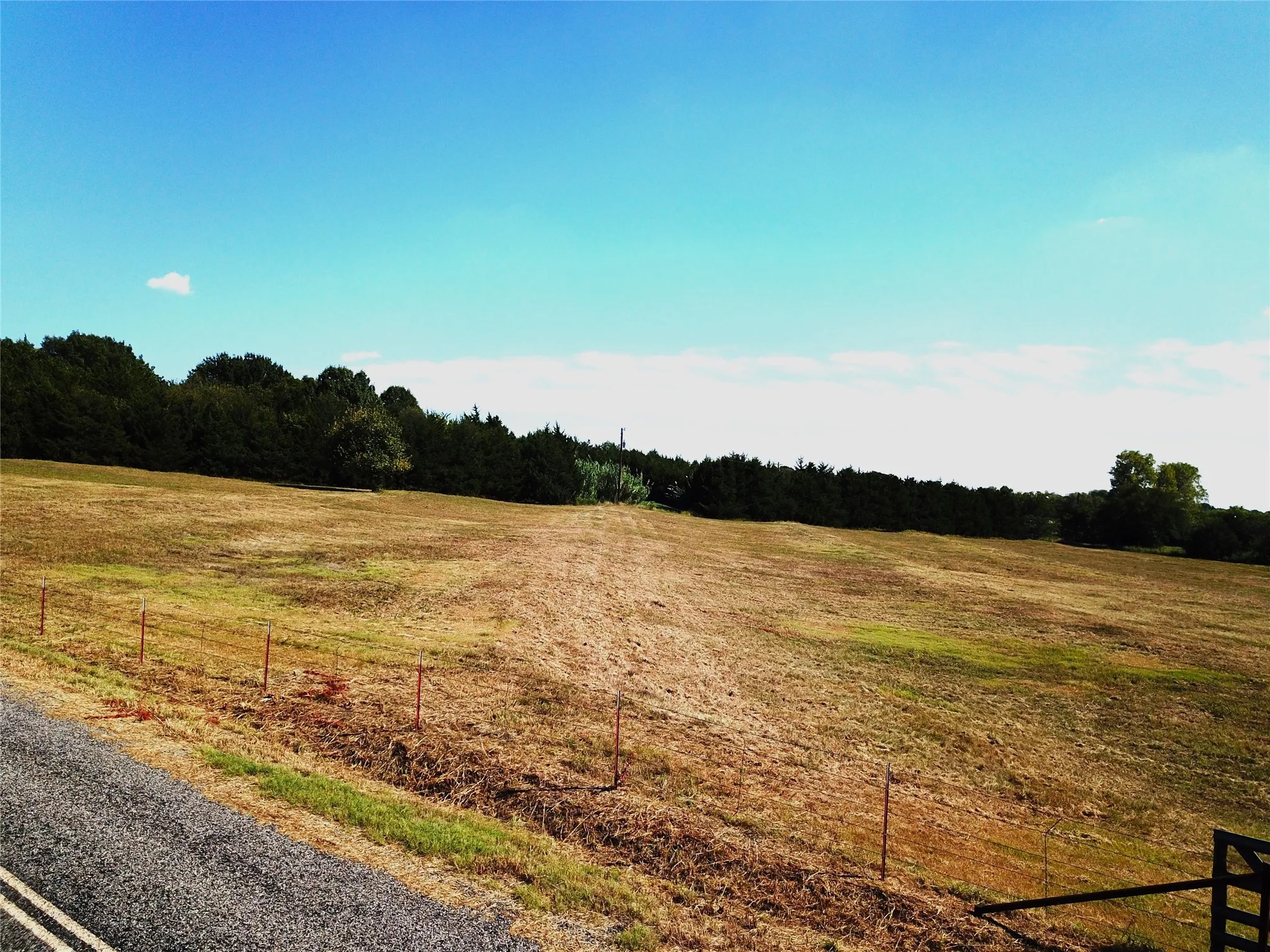 View of wooded area featuring a view of countryside