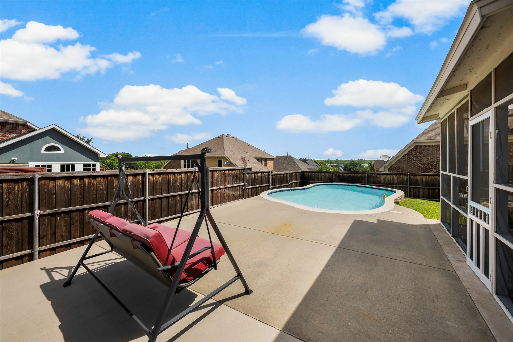 Screened in porch and pool