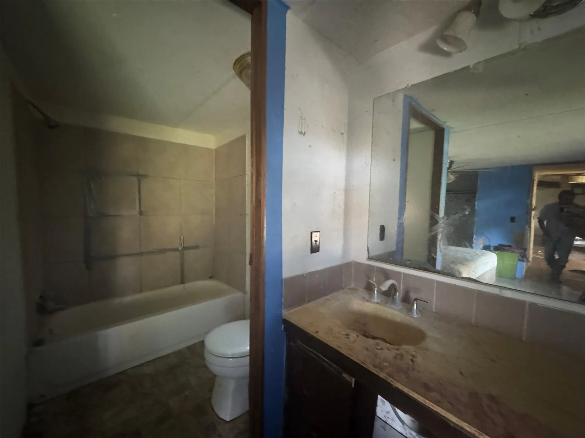 Bathroom with vanity and shower / bath combination