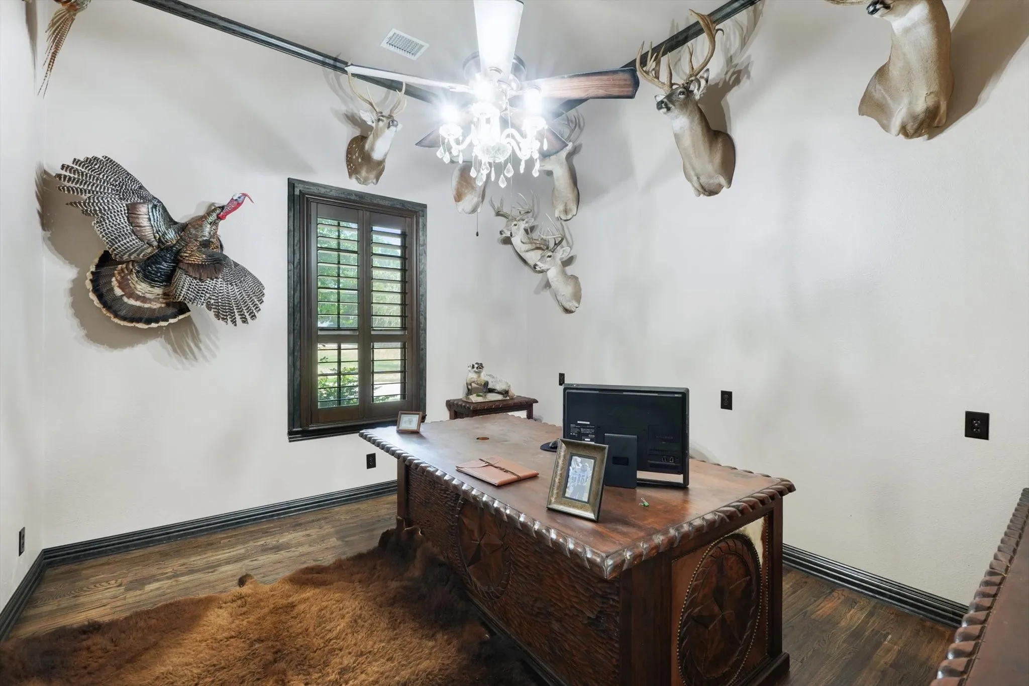Office with ceiling fan and wood finished floors