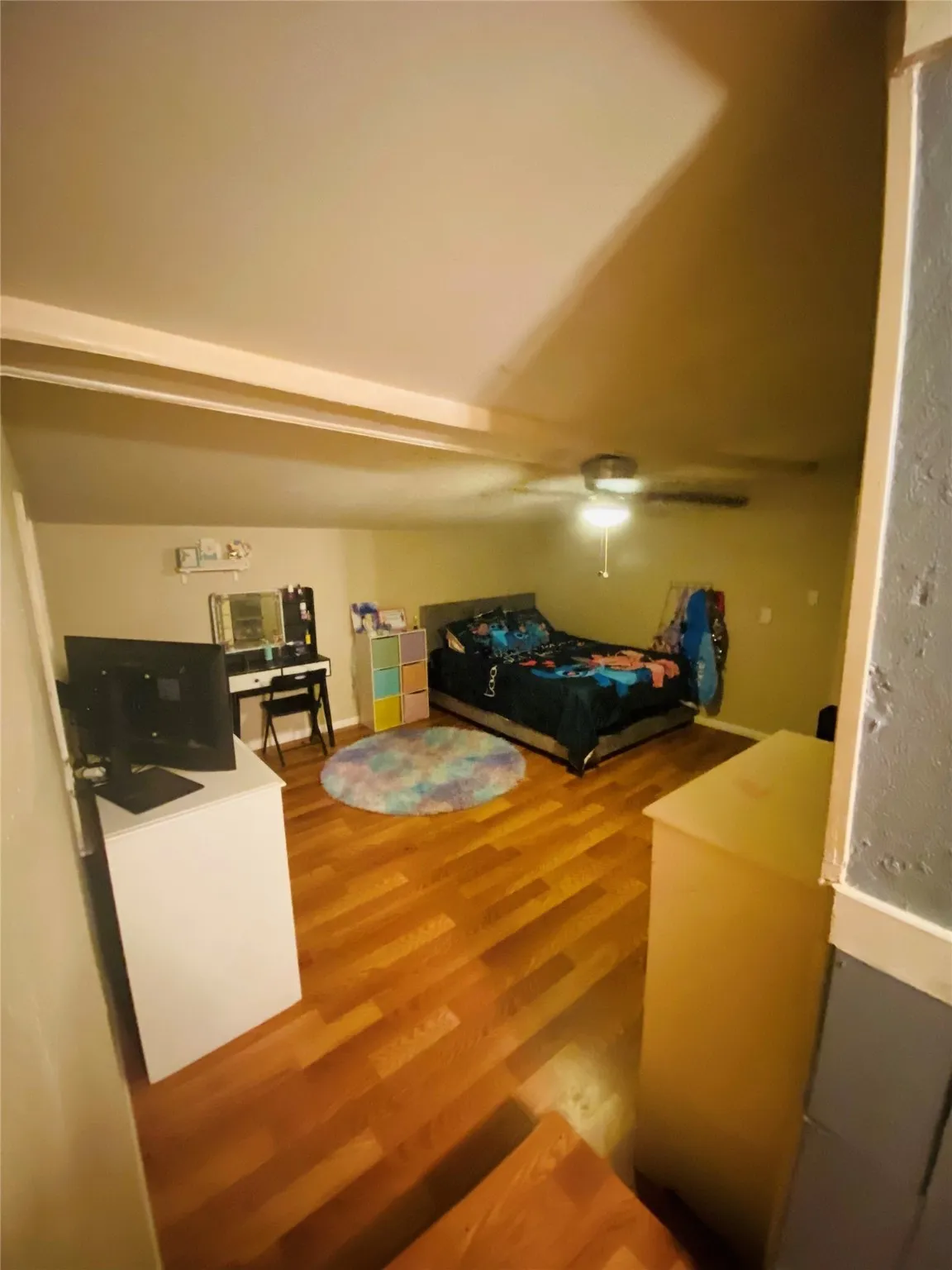 Bedroom featuring wood finished floors
