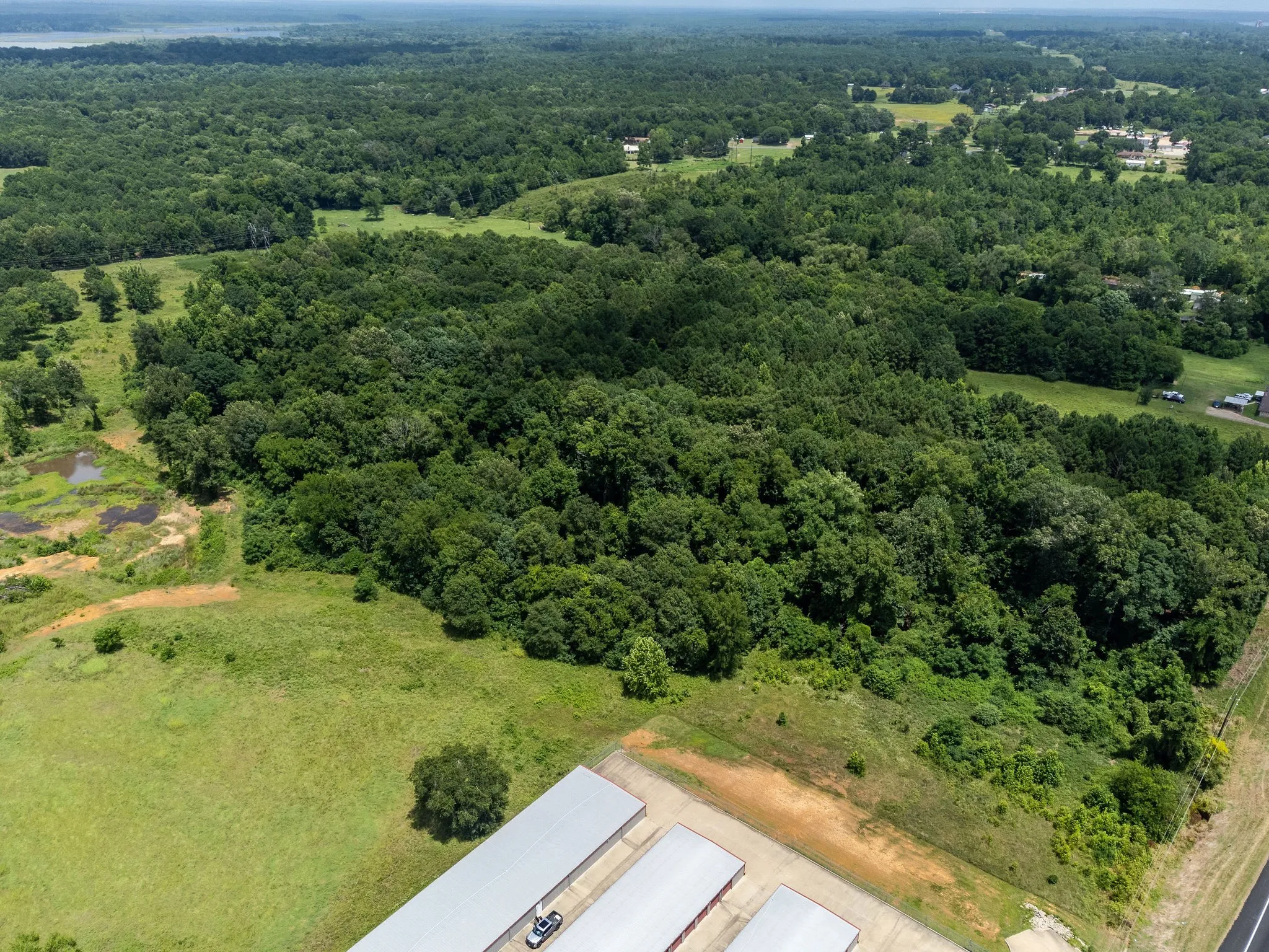 Drone / aerial view of a heavily wooded area