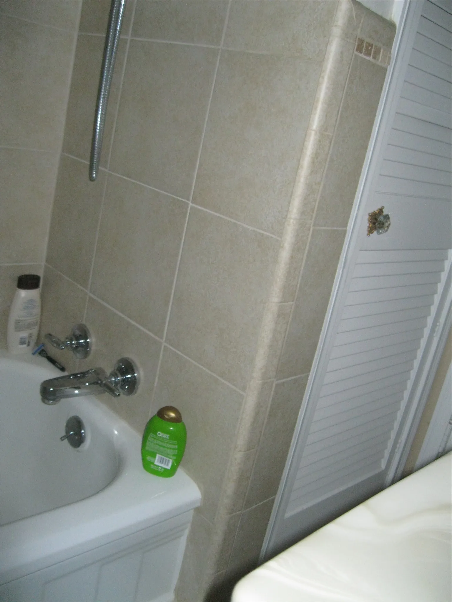 Bathroom featuring tub / shower combination